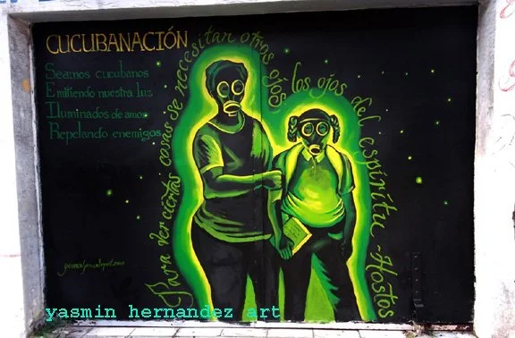 "CucubaNación", 2018. Outdoor Mural, 2 Calle San Vicente, Mayagüez, Puerto Rico
2018. Outdoor Mural, 2 Calle San Vicente, Mayagüez, Puerto Rico
Approx. 8’ x 10’
“We shall be cucubanos/ Emitting our light/ Illuminated with love/ Repelling enemies” –C