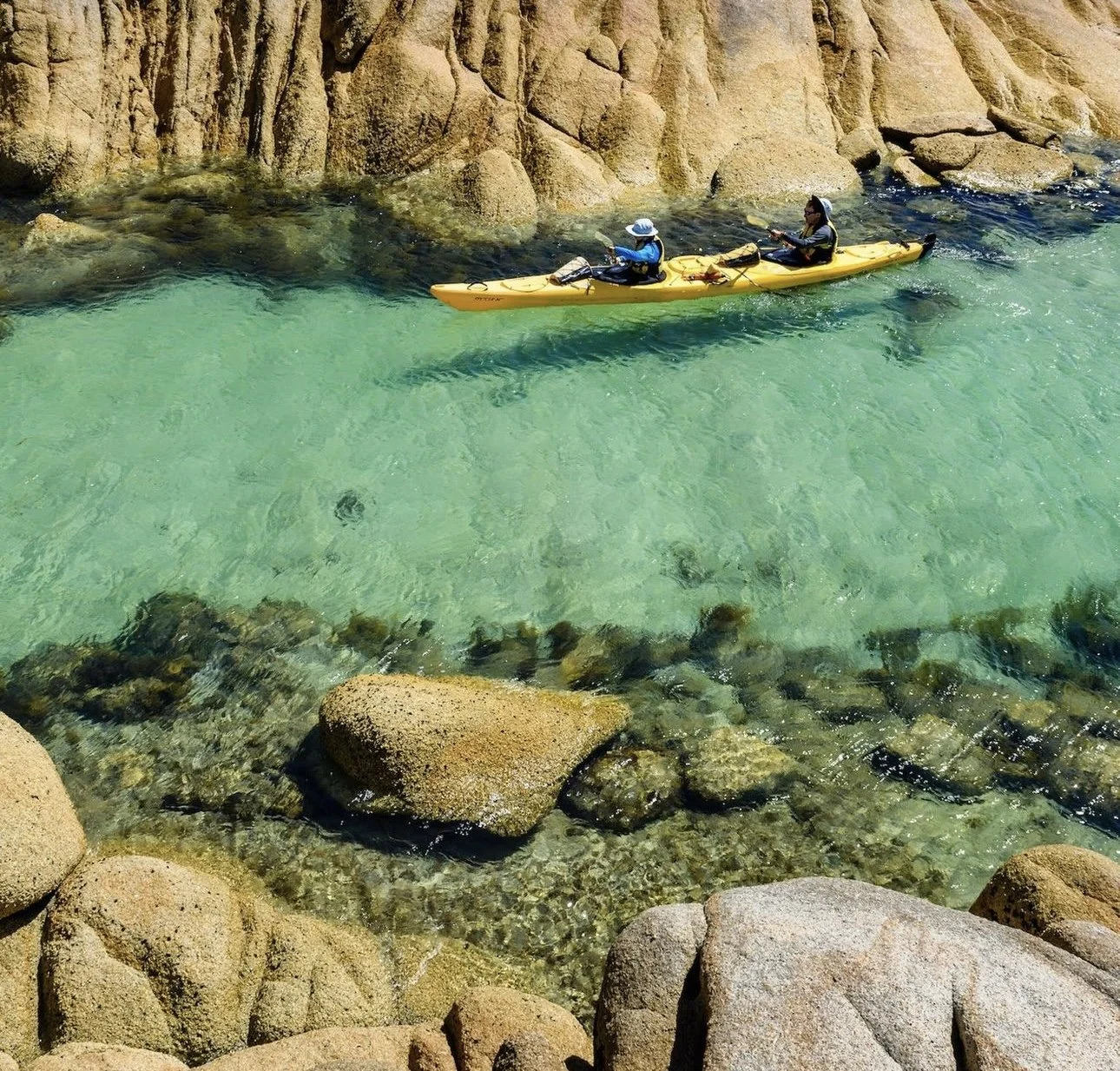 Flights to Flinders Island | Flinders Island Aviation | Pair kayaking with Roaring 40's Kayaking