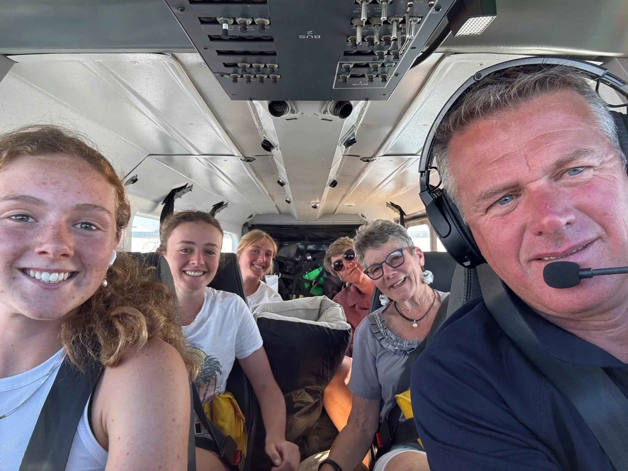 Flinders Island Aviation | Peter Barron and family on plane