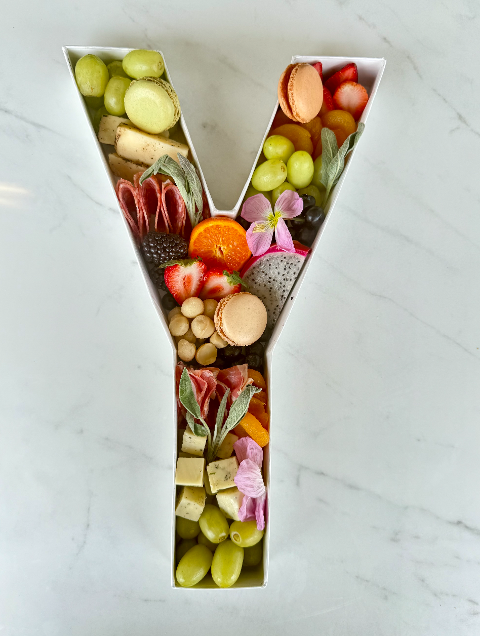 Personalized letters & numbers charcuterie boards perfect for birthdays, anniversaries & celebrations throughout the Ventura County . Order yours today!