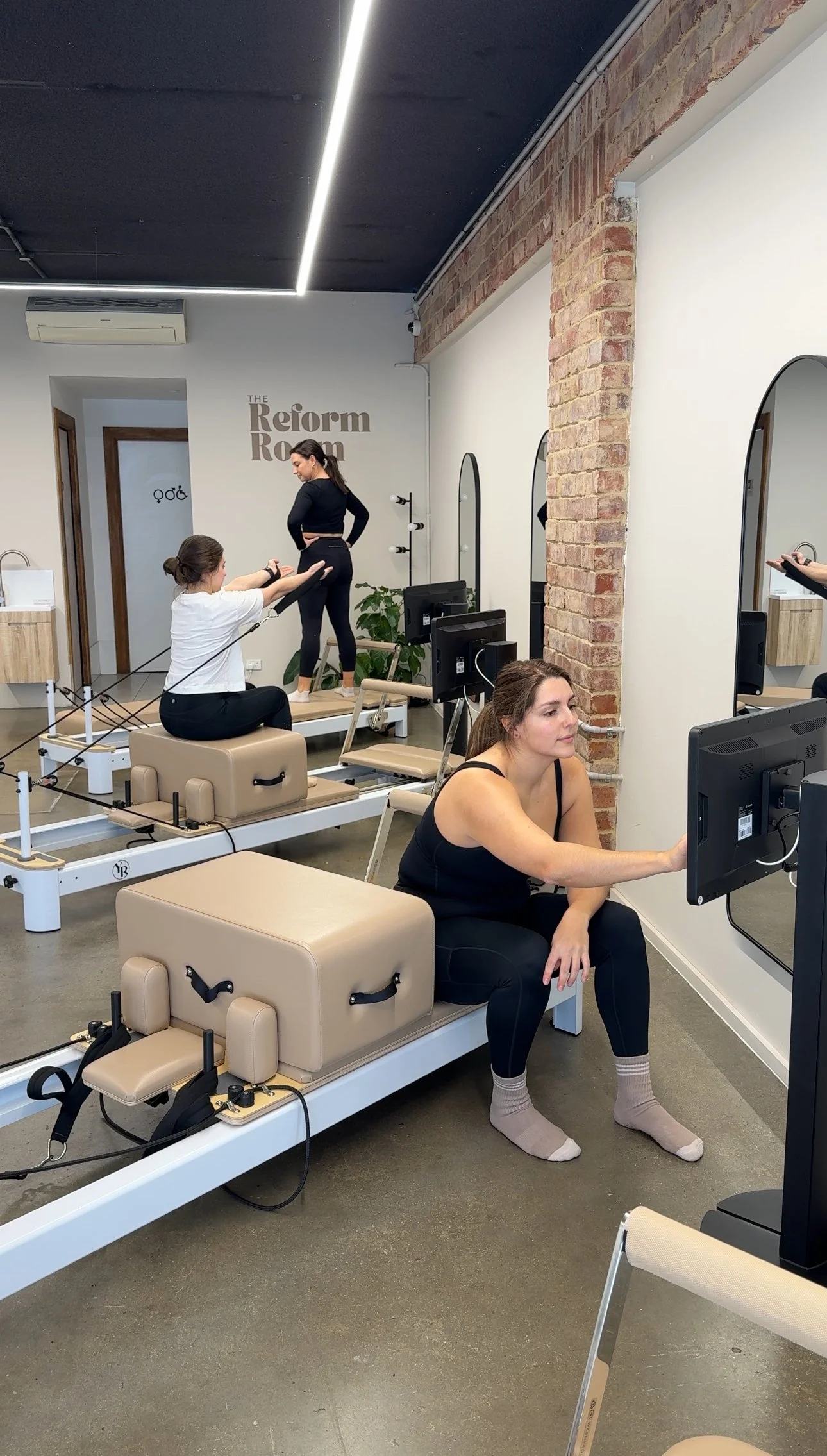 Members using reformer equipment