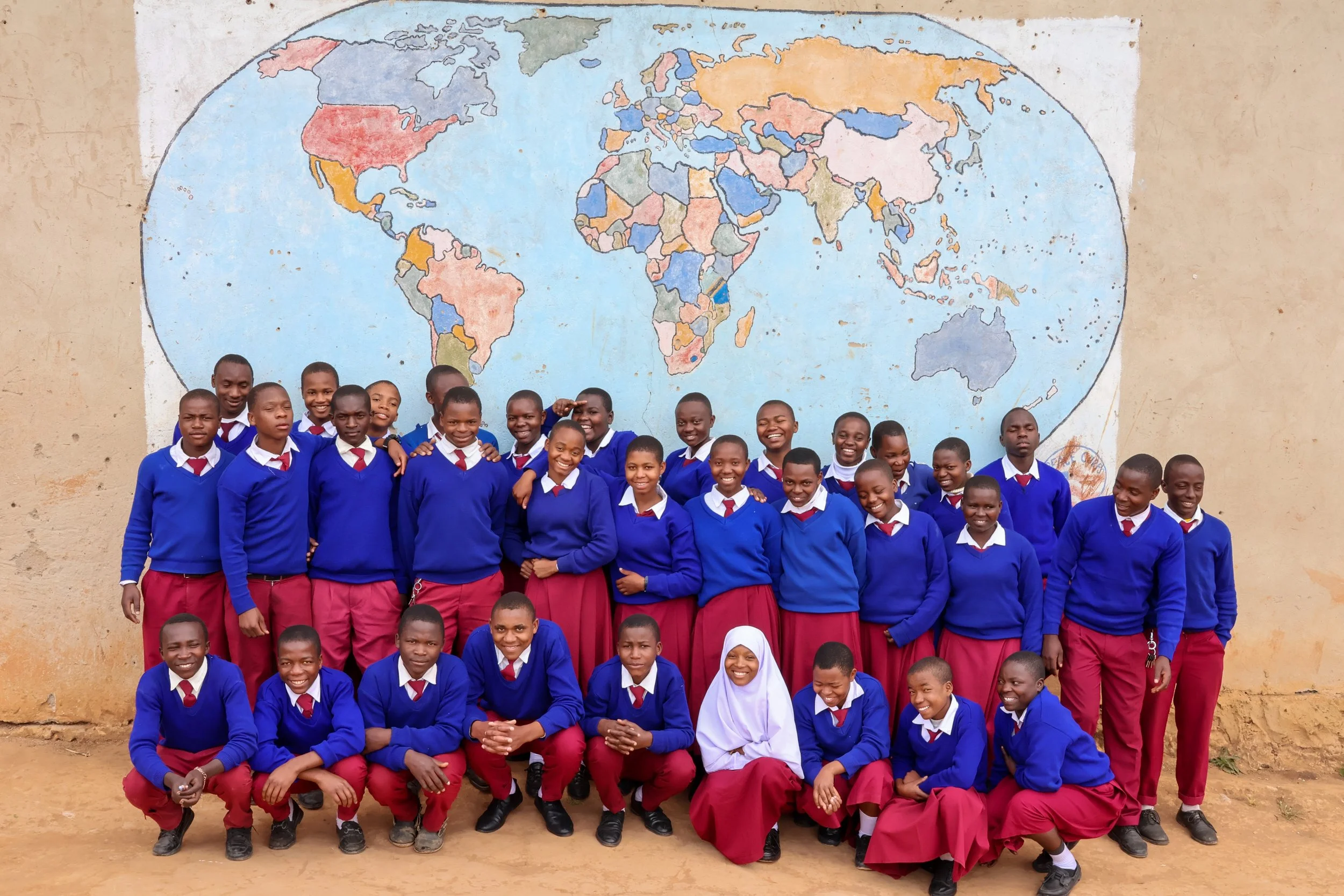  Students at school in front of the computer lab 