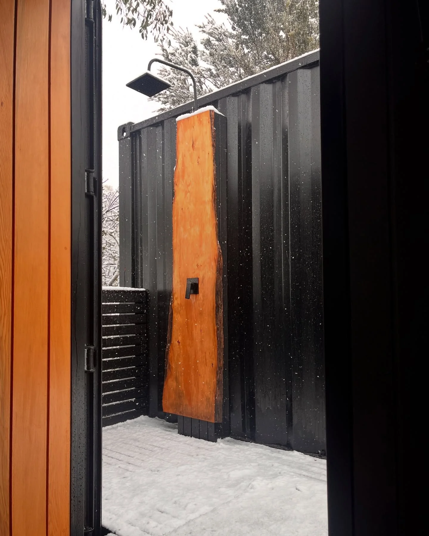 Cradle Mountain has been putting on a show this week. βοΈ 
Snow falling, steam rising, and a few brave souls taking on the cold shower. π§
There’s something about sitting in 80 degrees while the snow piles up outside that you really have to ex