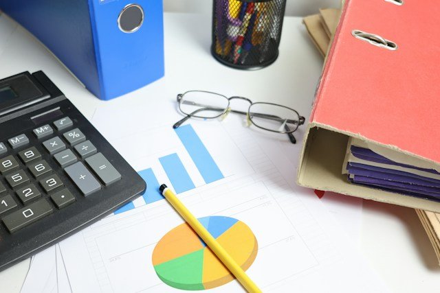 Charts and planning documents arranged on a desk
