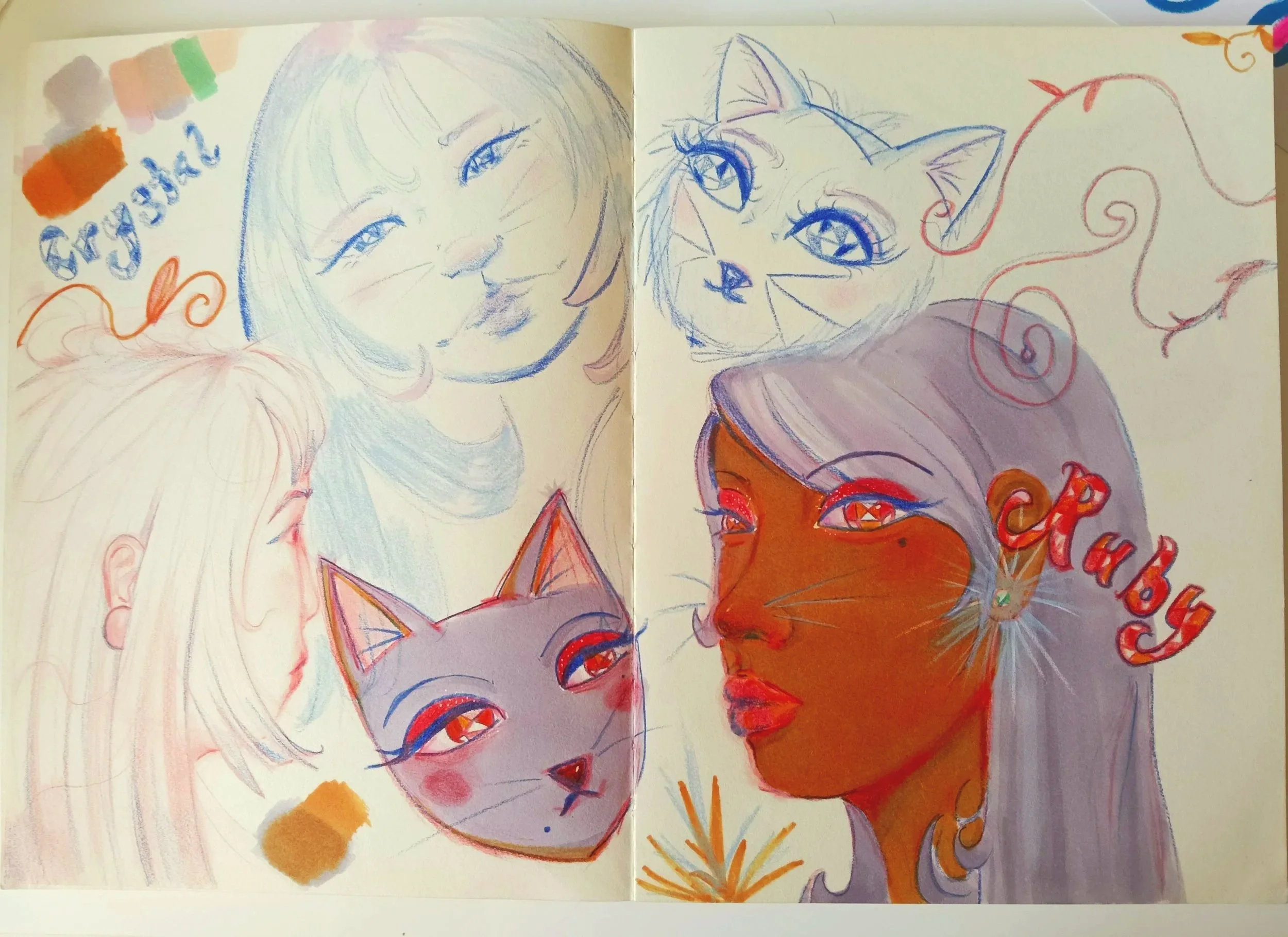 A colorful sketchbook page features four female faces drawn with vibrant markers, two of which are princess characters, and a girl's face with the words "Princess" and other decorative elements.
