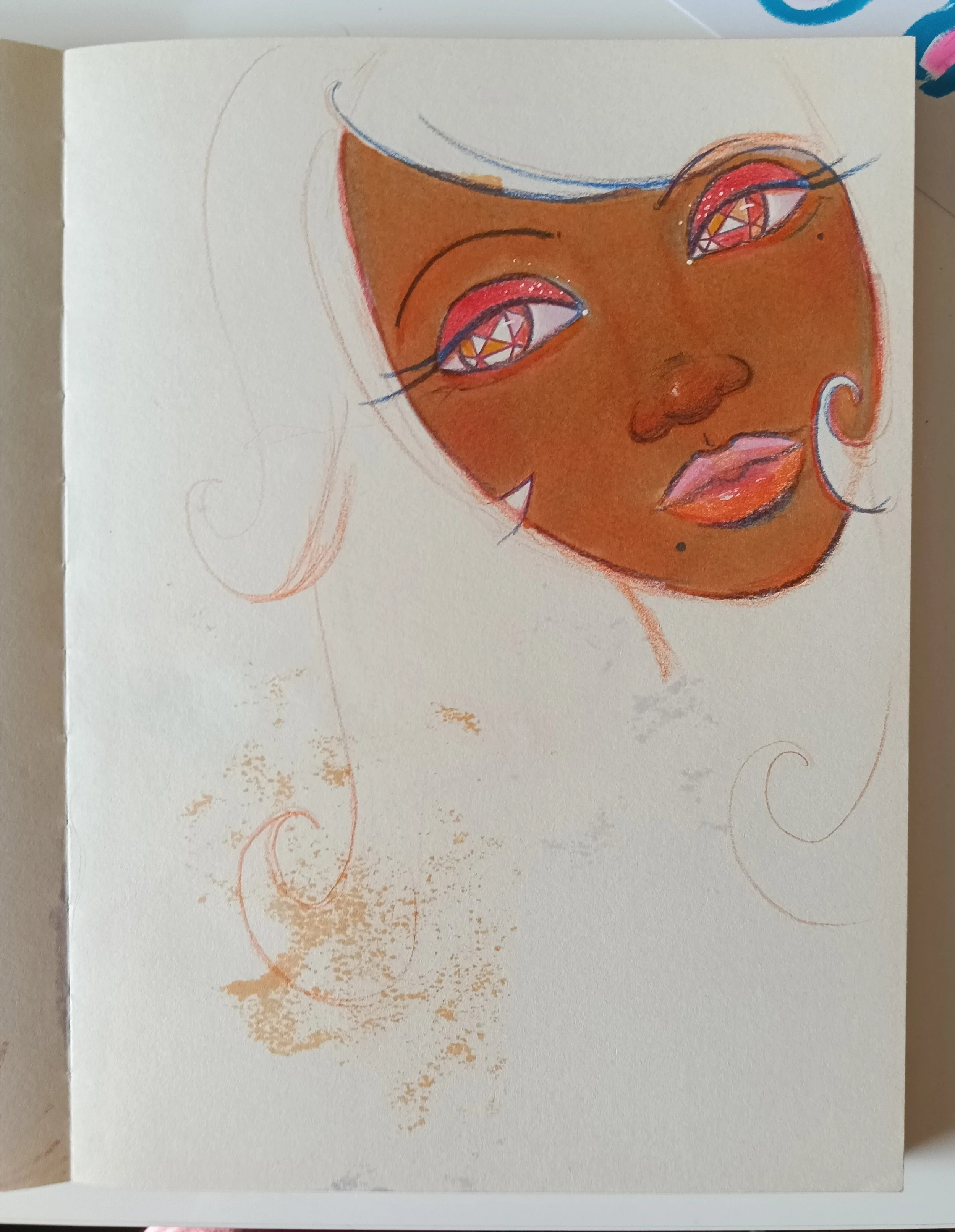 A colorful drawing of a person's face with brown skin, large eyes with geometric patterns, pink lips, and curly hair, on a white sheet of paper.