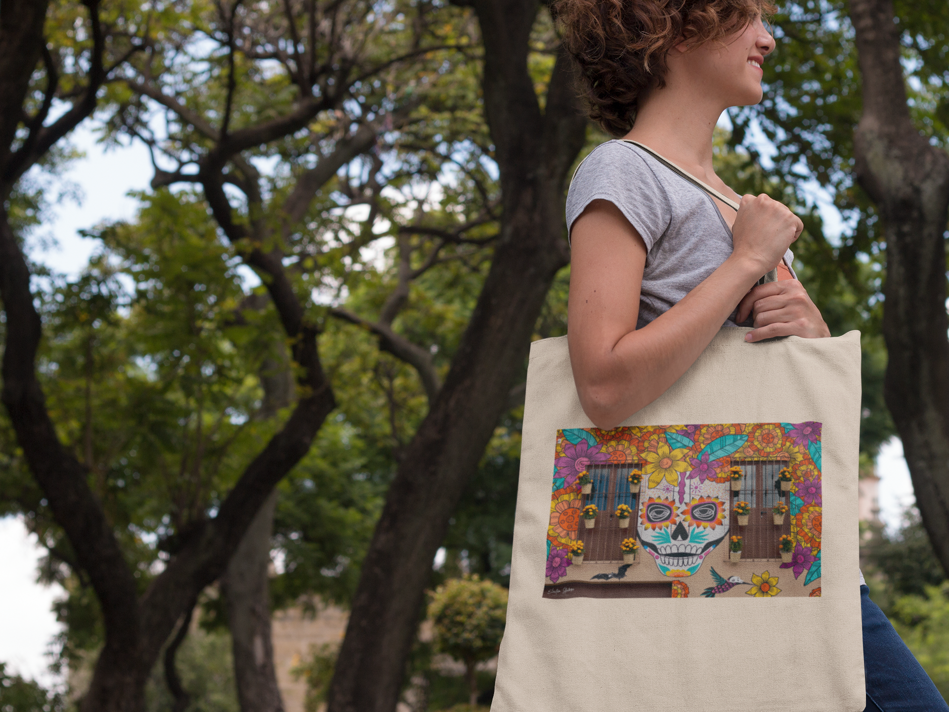 canvas-tote-bag-mockup-featuring-a-woman-in-a-park-a11453.png