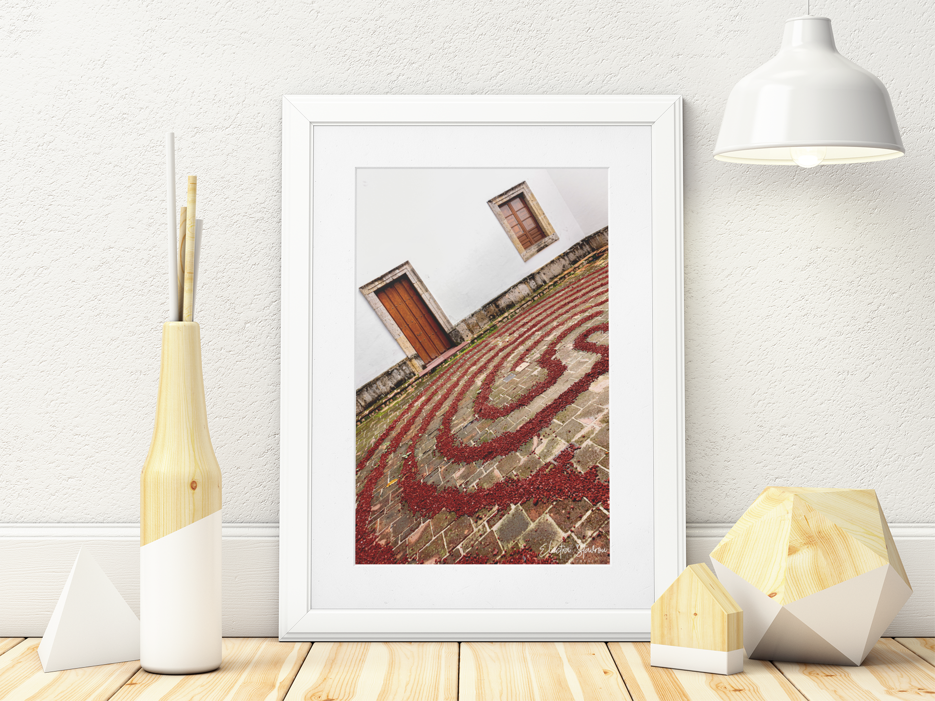 mockup-of-an-art-print-placed-on-a-wooden-surface-by-minimal-decorative-items-3968-el1.png