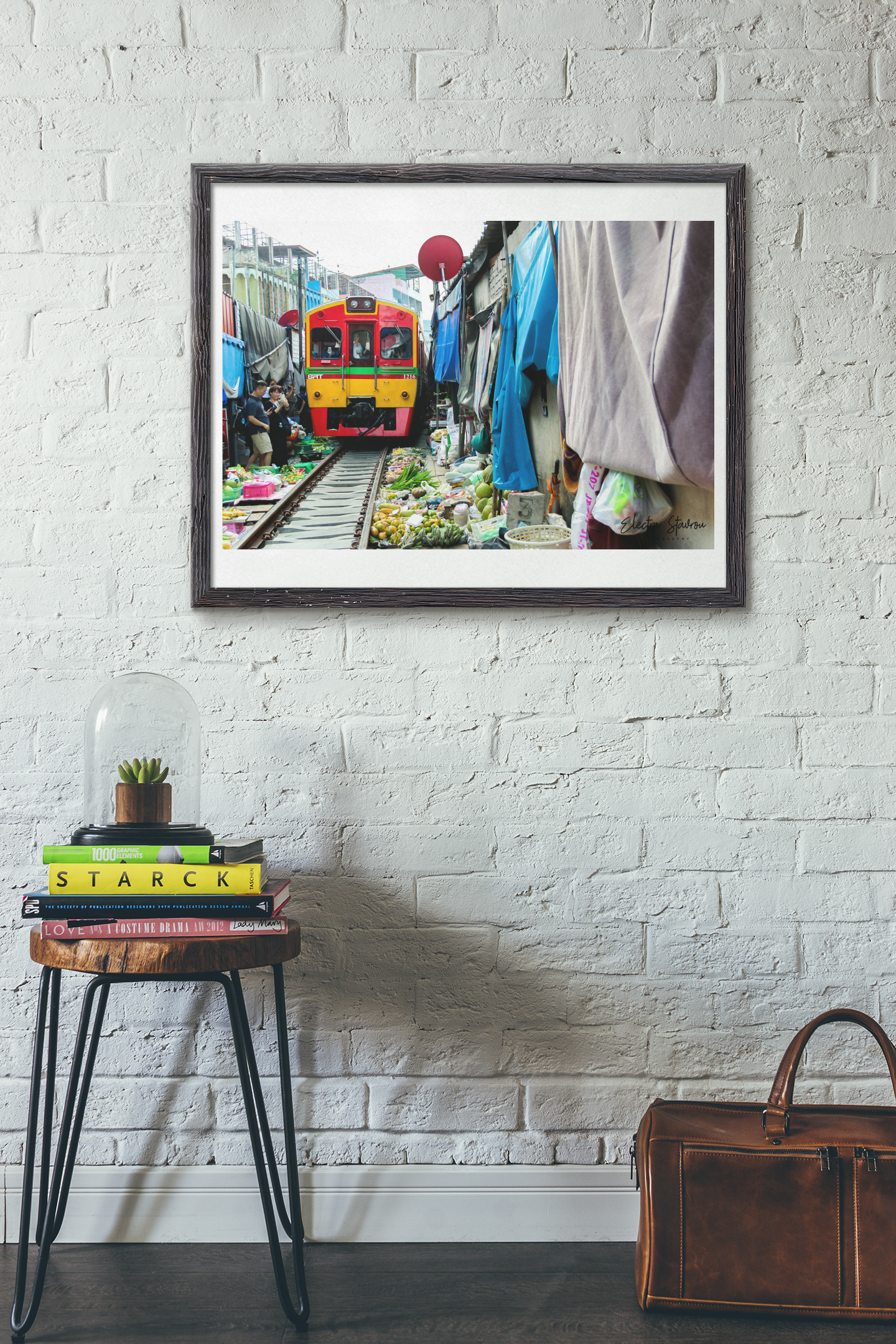 art-print-mockup-featuring-a-leather-suitcase-and-a-small-table-4879-el1.png