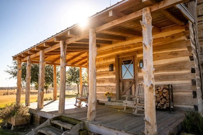 This original mid-1800s Hinze Family Cabin was relocated from Frelsburg, Texas to overlook the peaceful ponds and pastures of StarHill Farms. Fully restored with reclaimed wood, custom fixtures, and timeless antiques, it&rsquo;s the perfect place to 