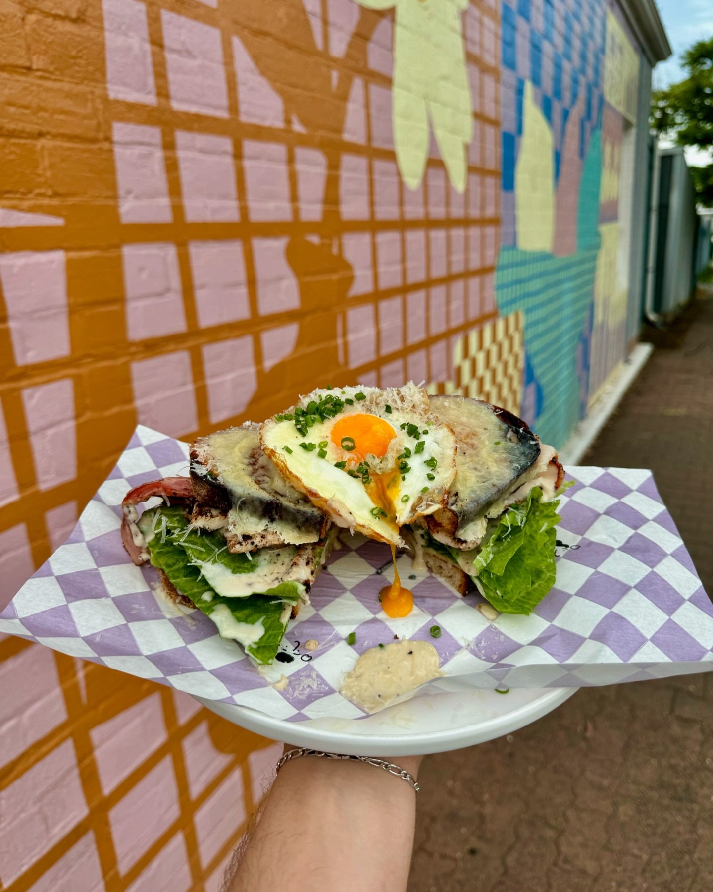 What slaps more than a chicken caesar salad on a warm day ? 🤔

A chicken caesar club sando, that&rsquo;s what! This sando is the perfect combination of juicy grilled chicken breast, crisp cos lettuce, house dressing, fried egg, bacon, grana padano &