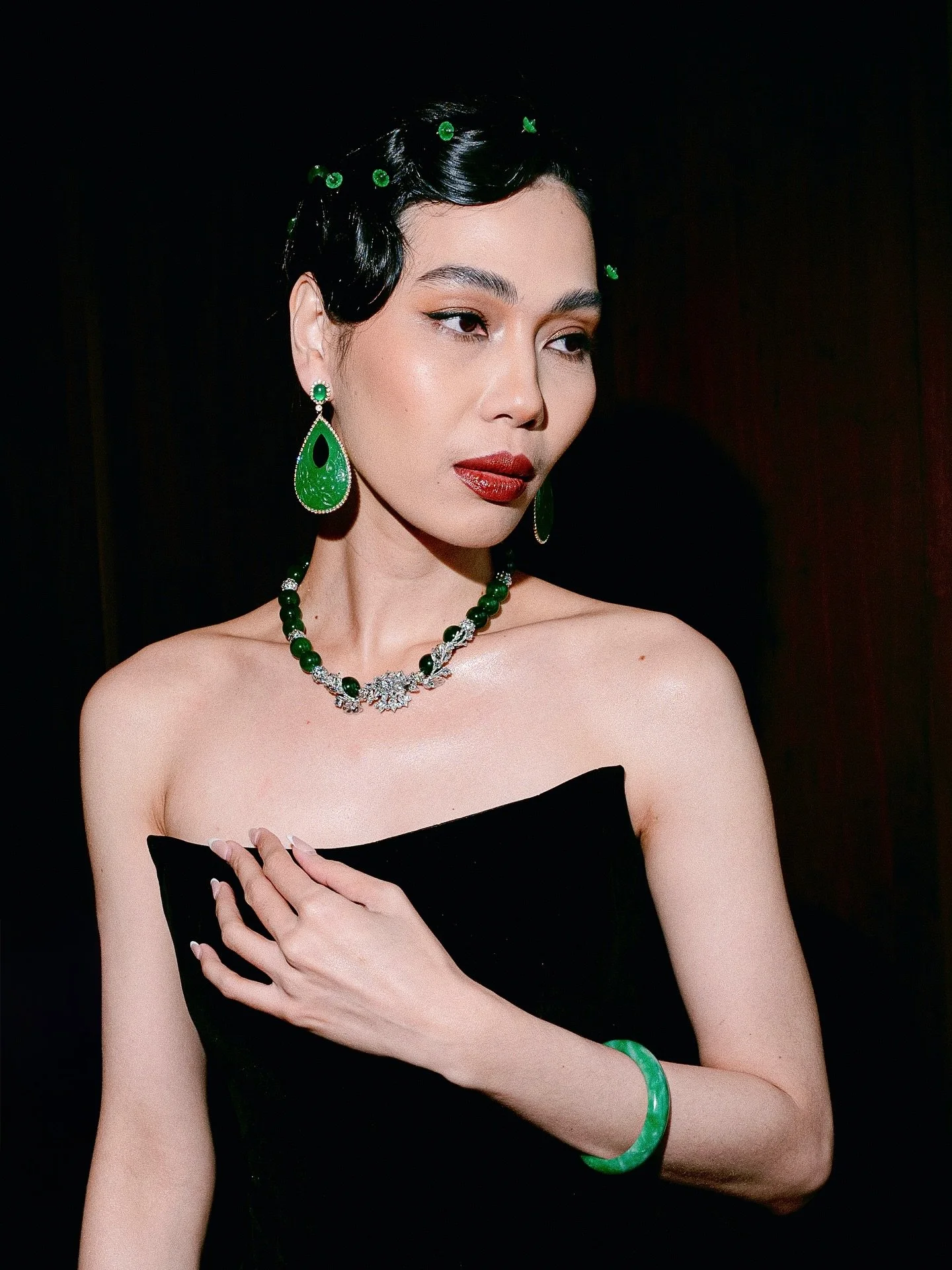 The lady in green and black. Lighting up the room with her jade jewels and stunning black dress. 

Celestial Bloom &mdash; a special showcase of elegance with @stellalunardy @lunebystella at @langham_jakarta @tangcourtjakarta for this Lunar New Year 