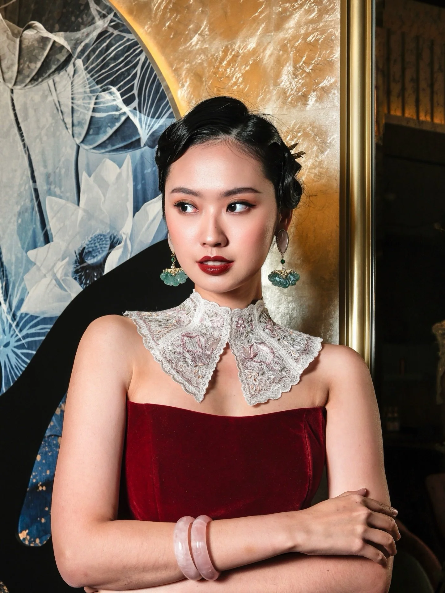 A close-up of a red Lunar New Year look 

Celestial Bloom &mdash; a special showcase of elegance with @stellalunardy @lunebystella at @langham_jakarta @tangcourtjakarta for this Lunar New Year supported by @bankbri_id 

muse: @fionahan___ &mdash; @ji