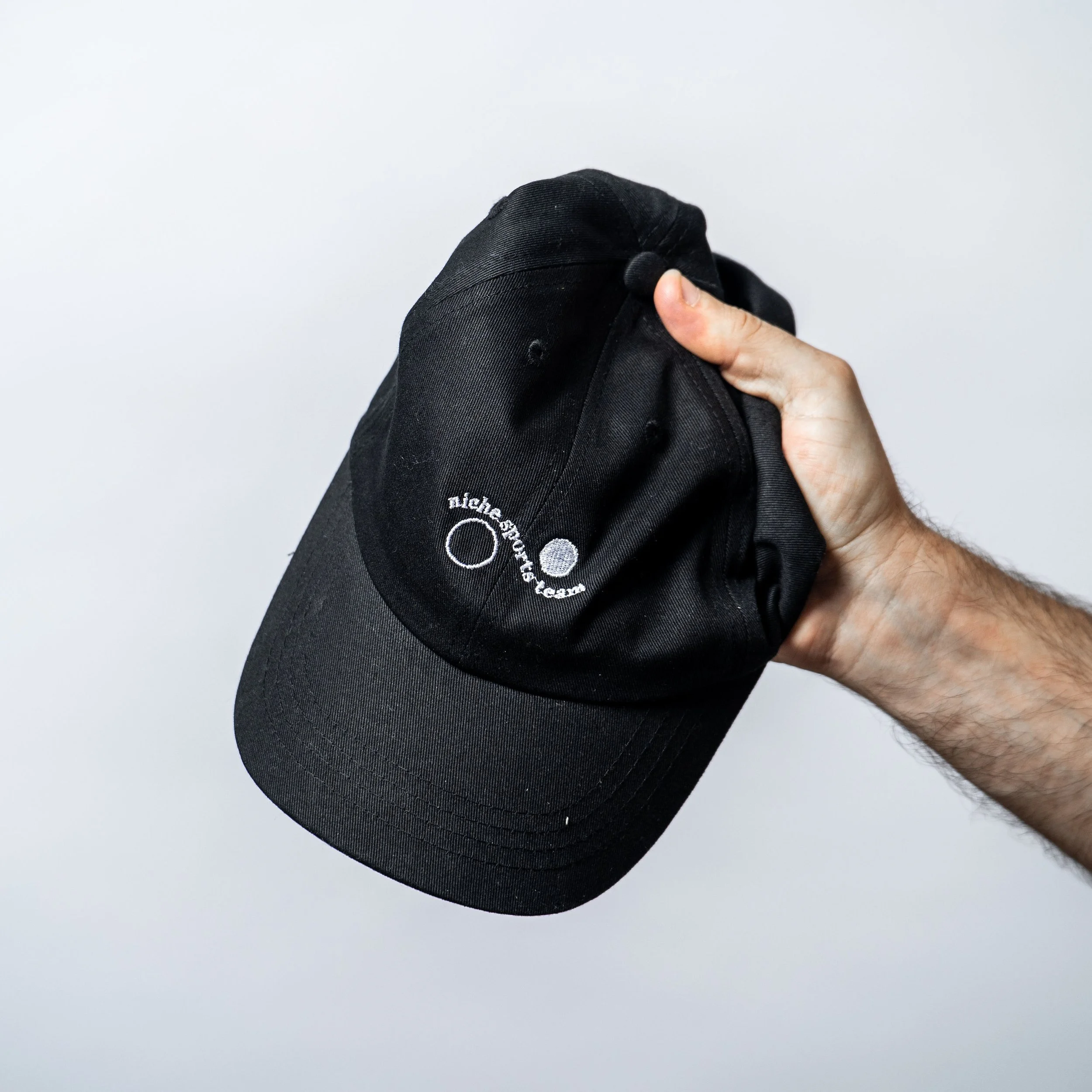 Niche Sports Team Dad Cap | Black