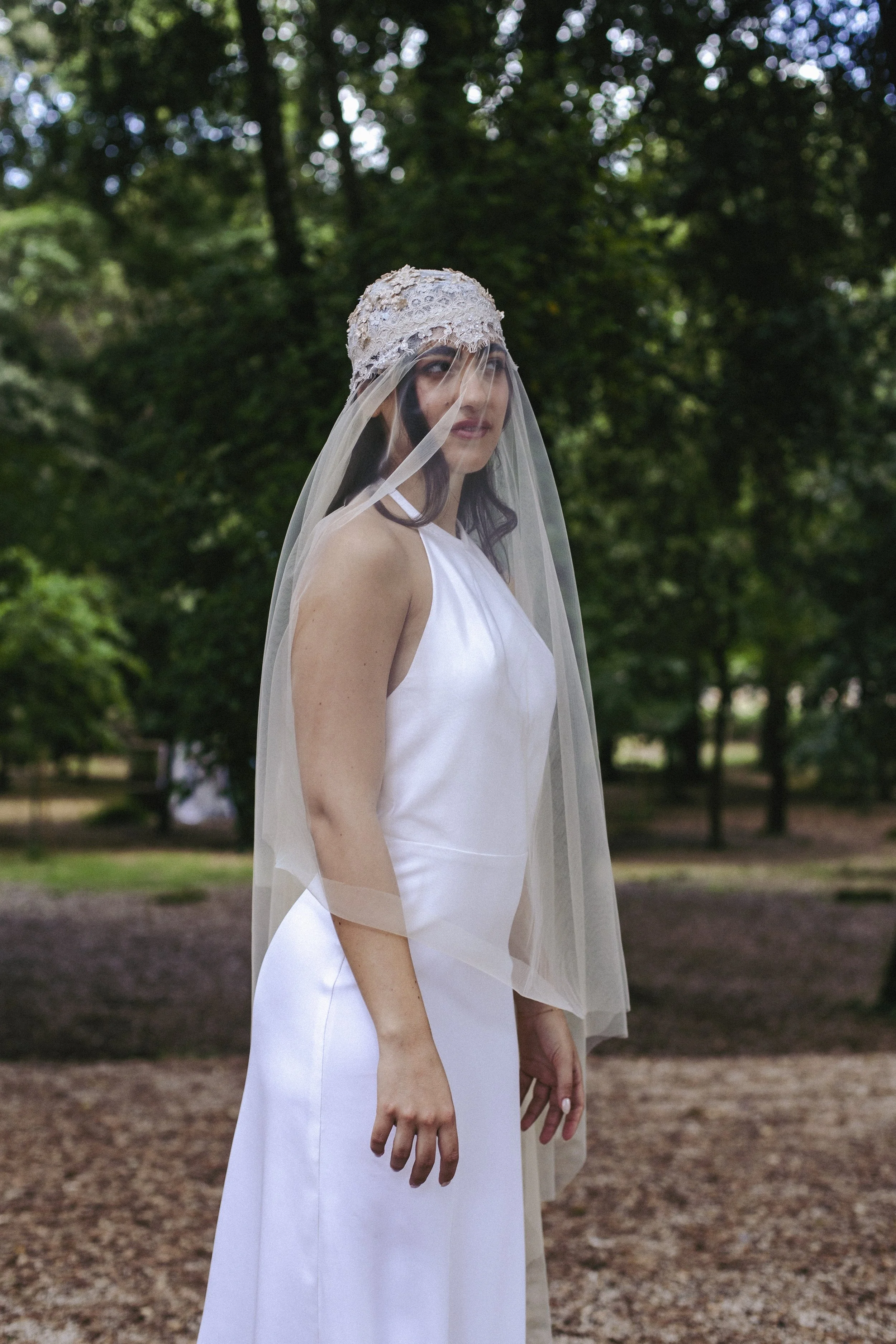 
Iris
Starting from €1,100
A minimalist halter-neck bridal gown in 100% silk drape, featuring a deep open back with a delicate button closure. Clean lines, fluid silhouette and an effortless elegance that moves beautifully with the body.

Cornucopia 