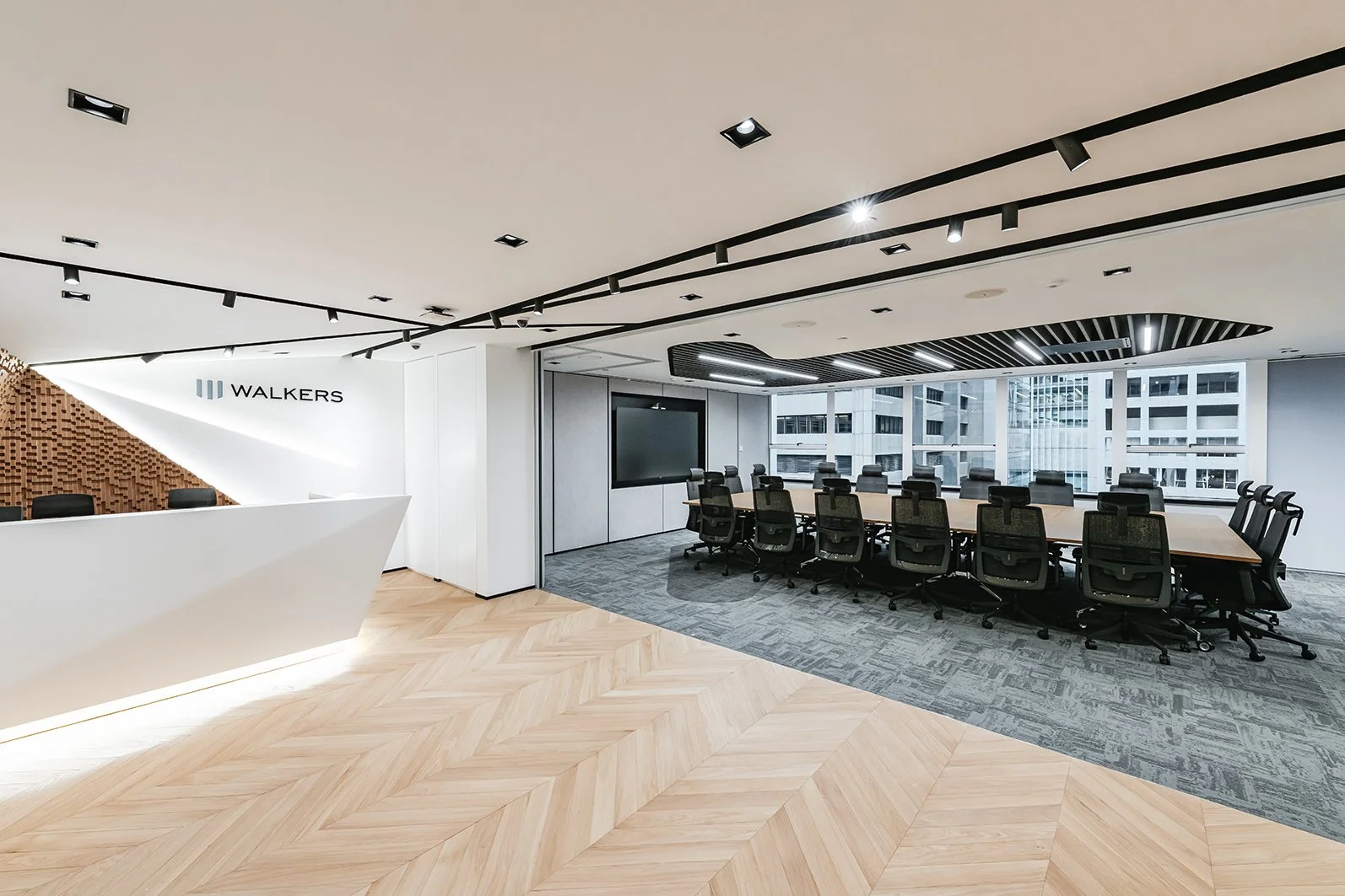 Redesign and reconfiguration of a global law firm's office in Alexandra House, Central Hong Kong, with adaptable spaces that double as event venues for client functions.