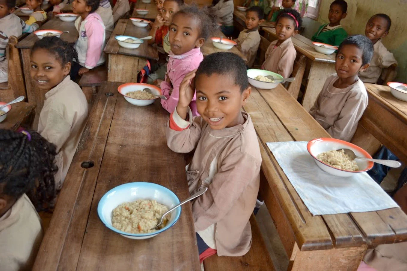 Rise Against Hunger meals served to children in Madagascar.