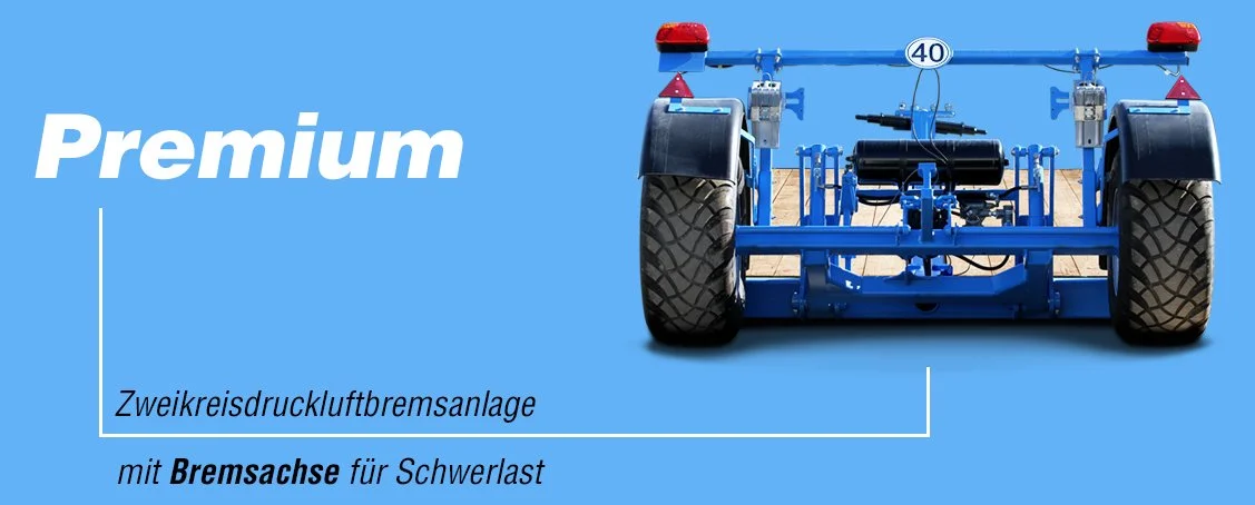 Blick auf die Vorderseite eines blauen landwirtschaftlichen Fahrzeugs mit breiten Reifen, das als zweireihiges Druckluftbremssystem mit Bremsachse für Schwerlasten bezeichnet wird.