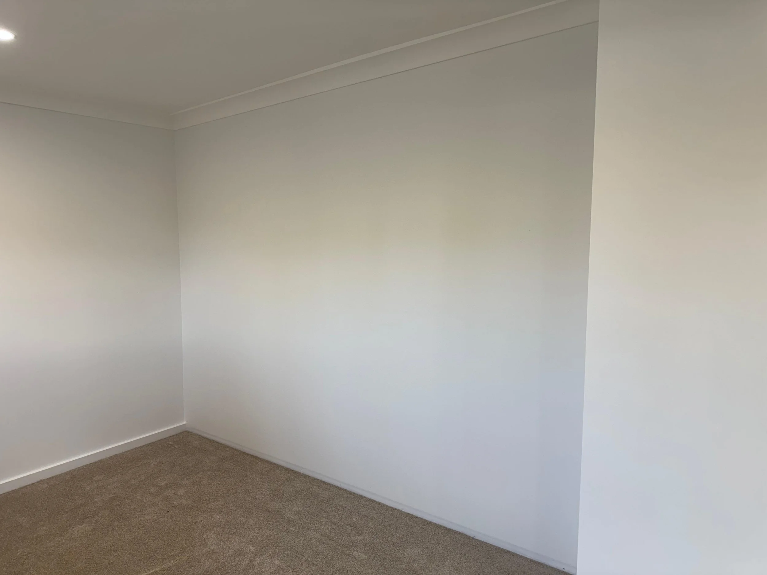 Empty wall space before built-in wardrobe installation