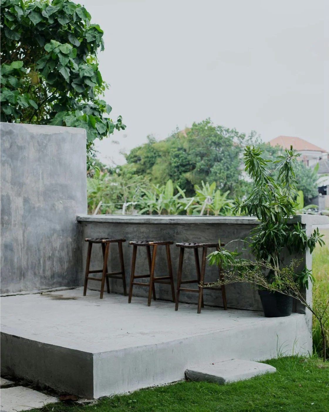 Photograph of concrete patio without exterior paint colors