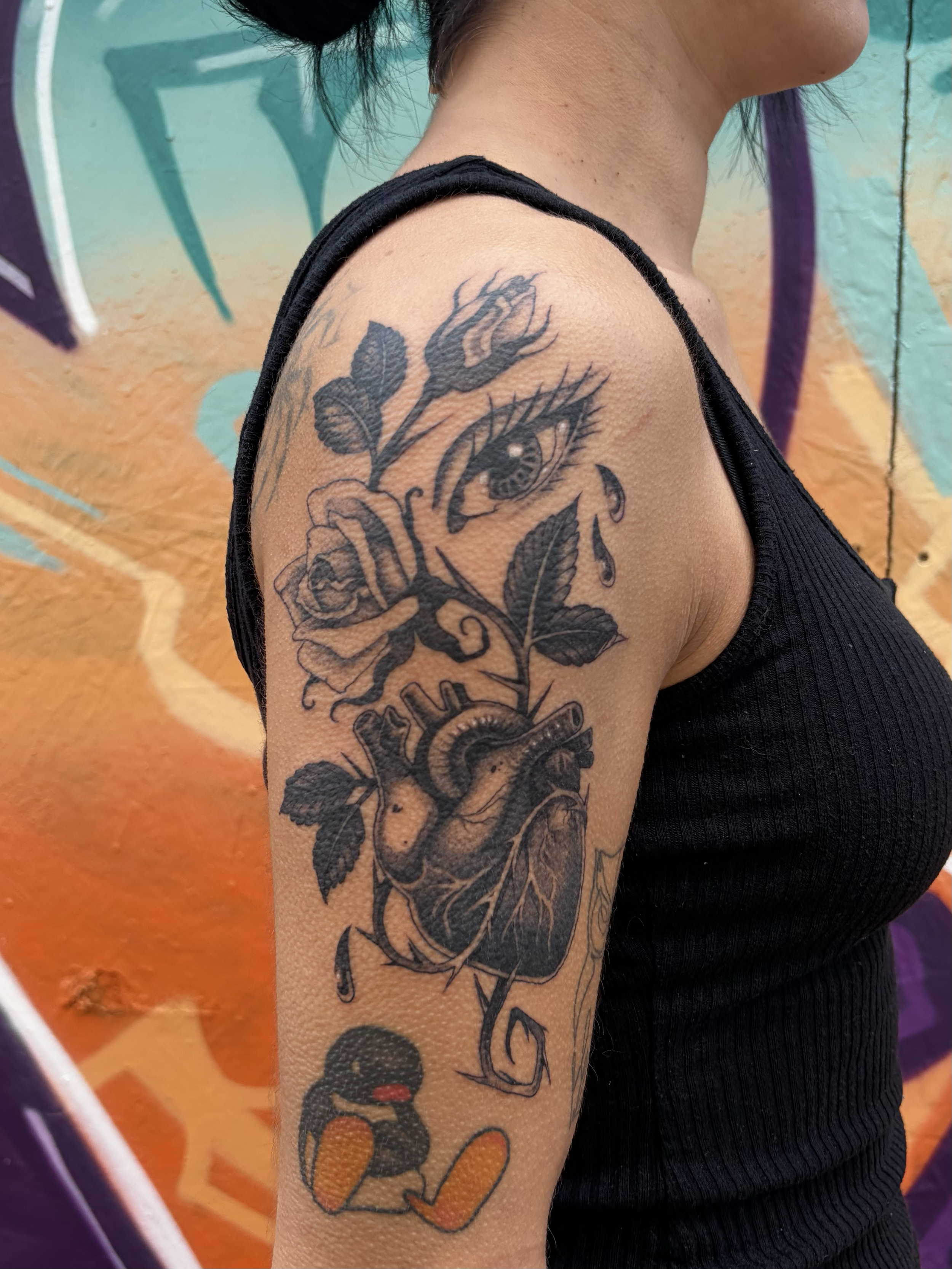 anatomical heart roses eye black and grey blackwork tattoo