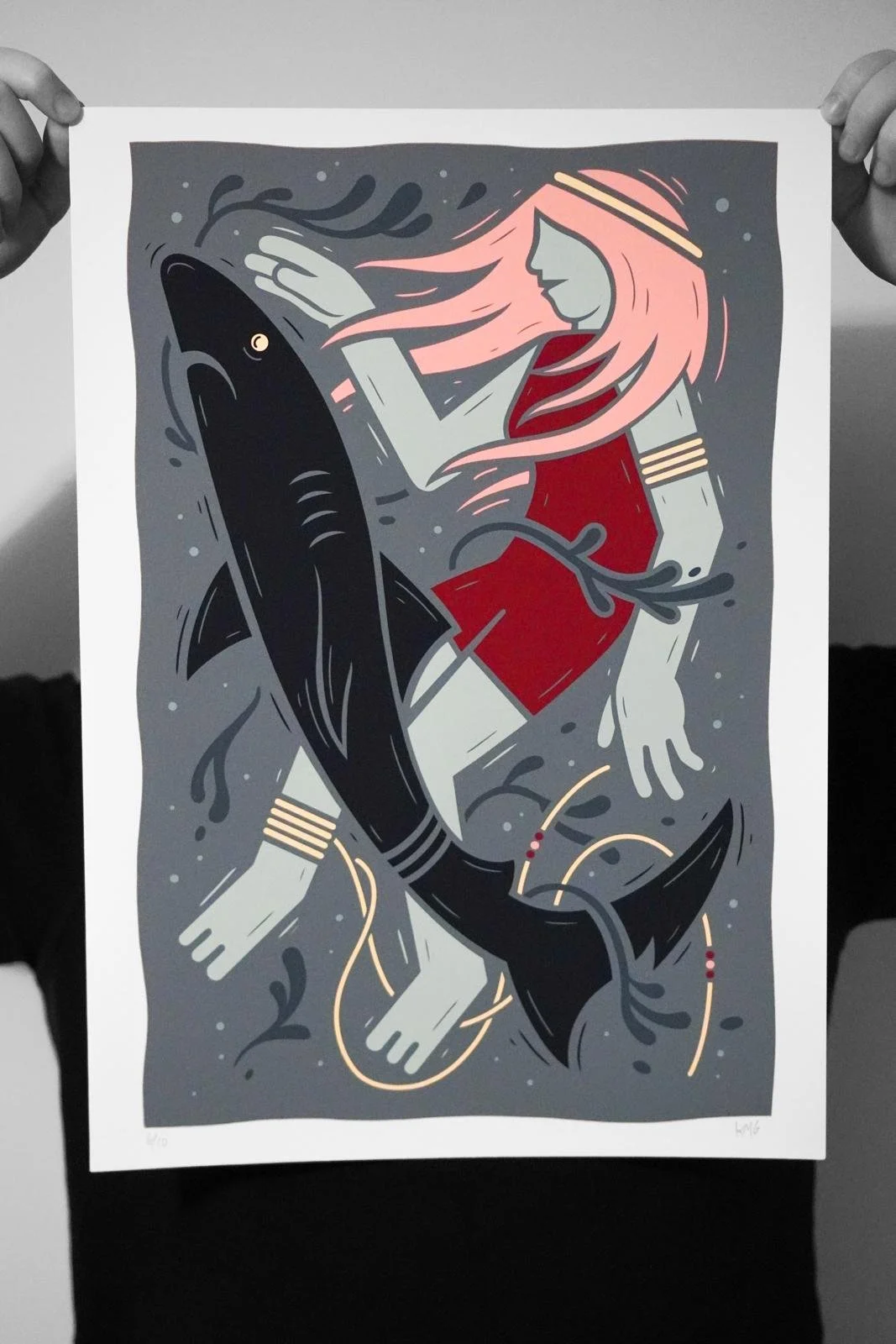 Digital illustration of a girl with long pink hair in a red dress holding a large black fish underwater.