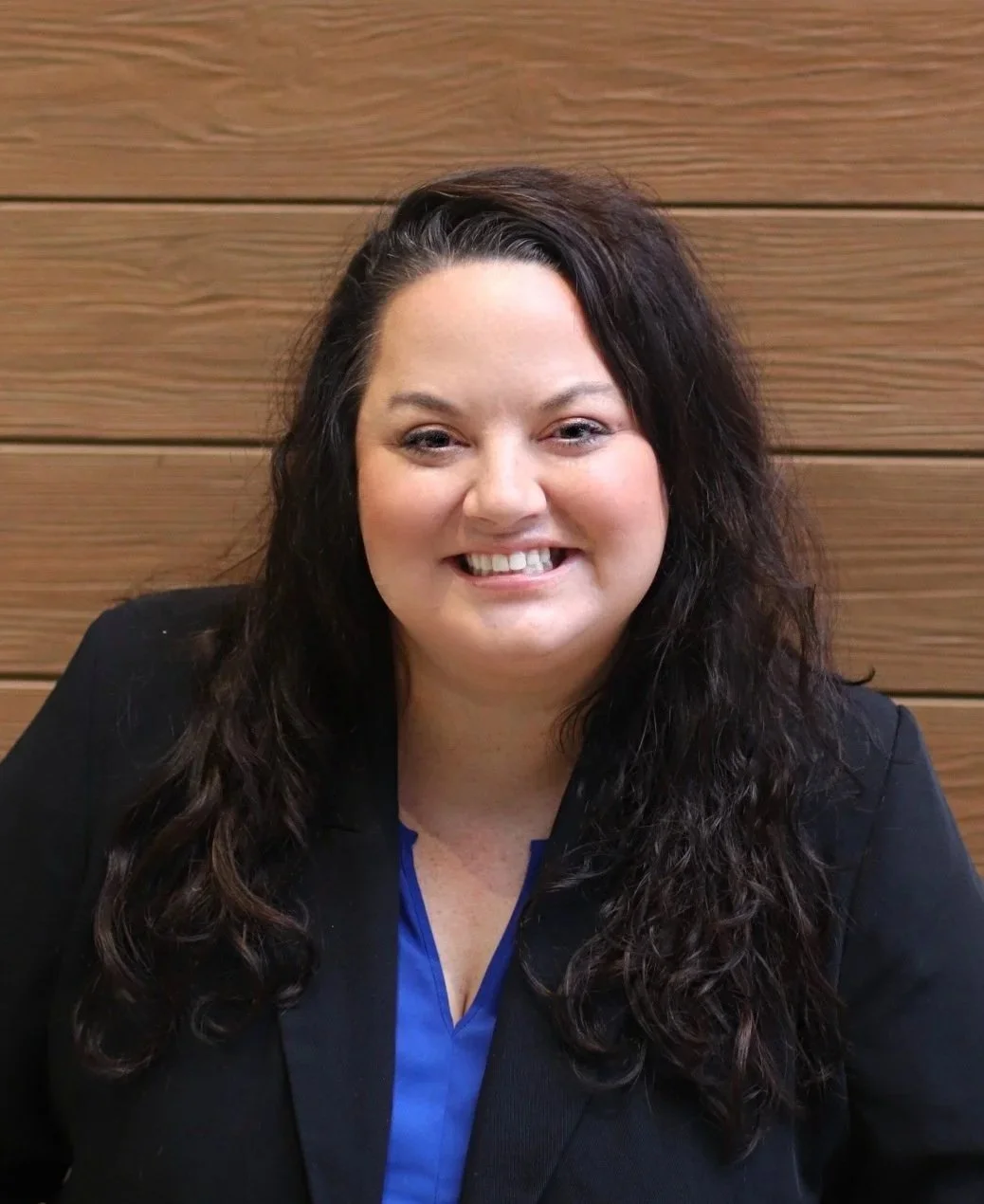 Meghan Powell, a music educator from Iowa, a woman with long dark hair