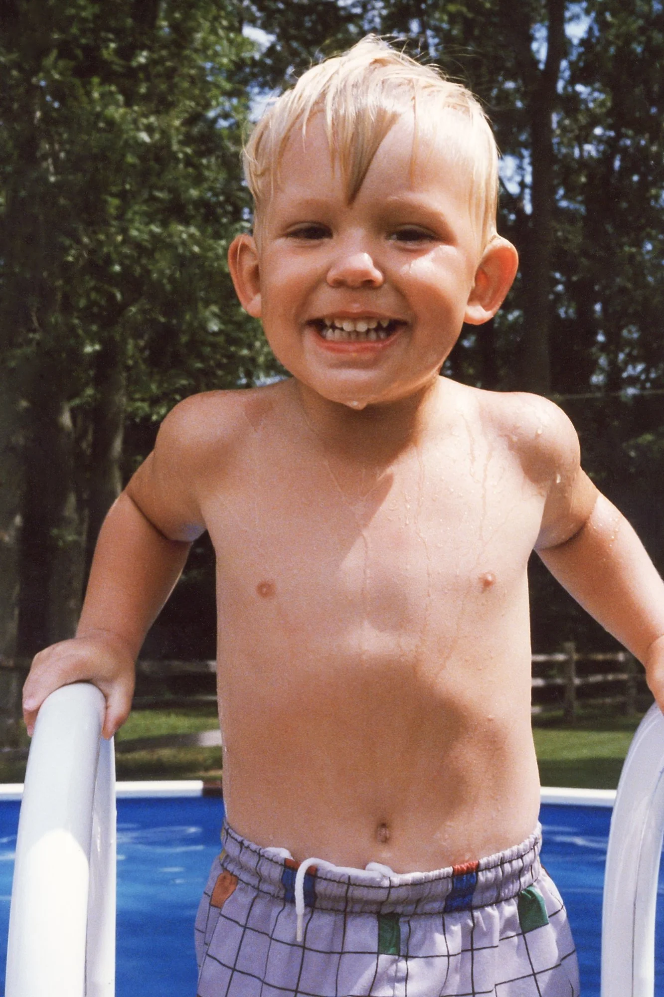 Erik enjoying a swim at a friend house.