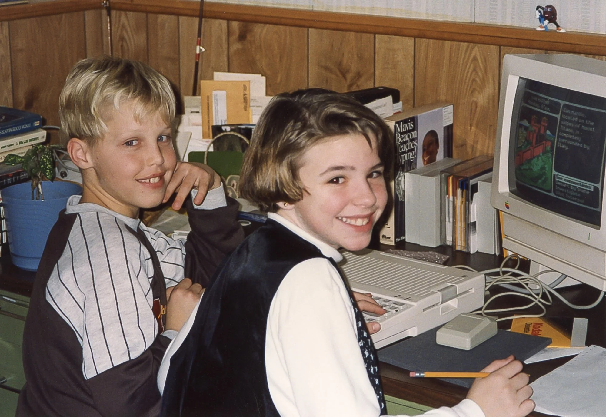 Brad and Kelly working on the computer. 