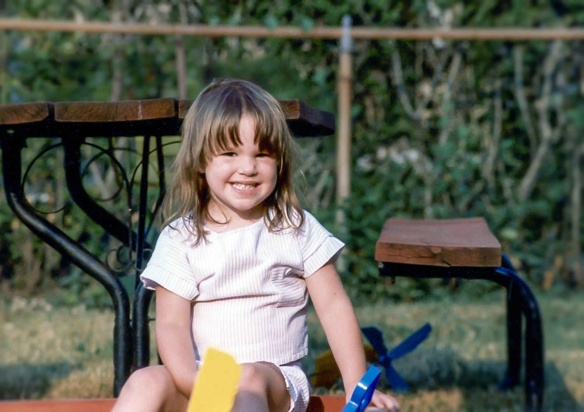 Playing in the sandbox during the summer of 1982.