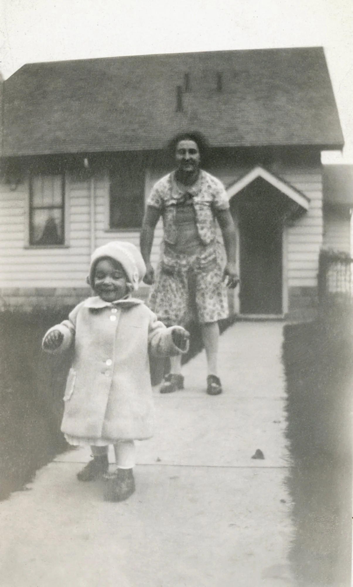 Sue showing her speed walking skills at an early age. See you later Mom!