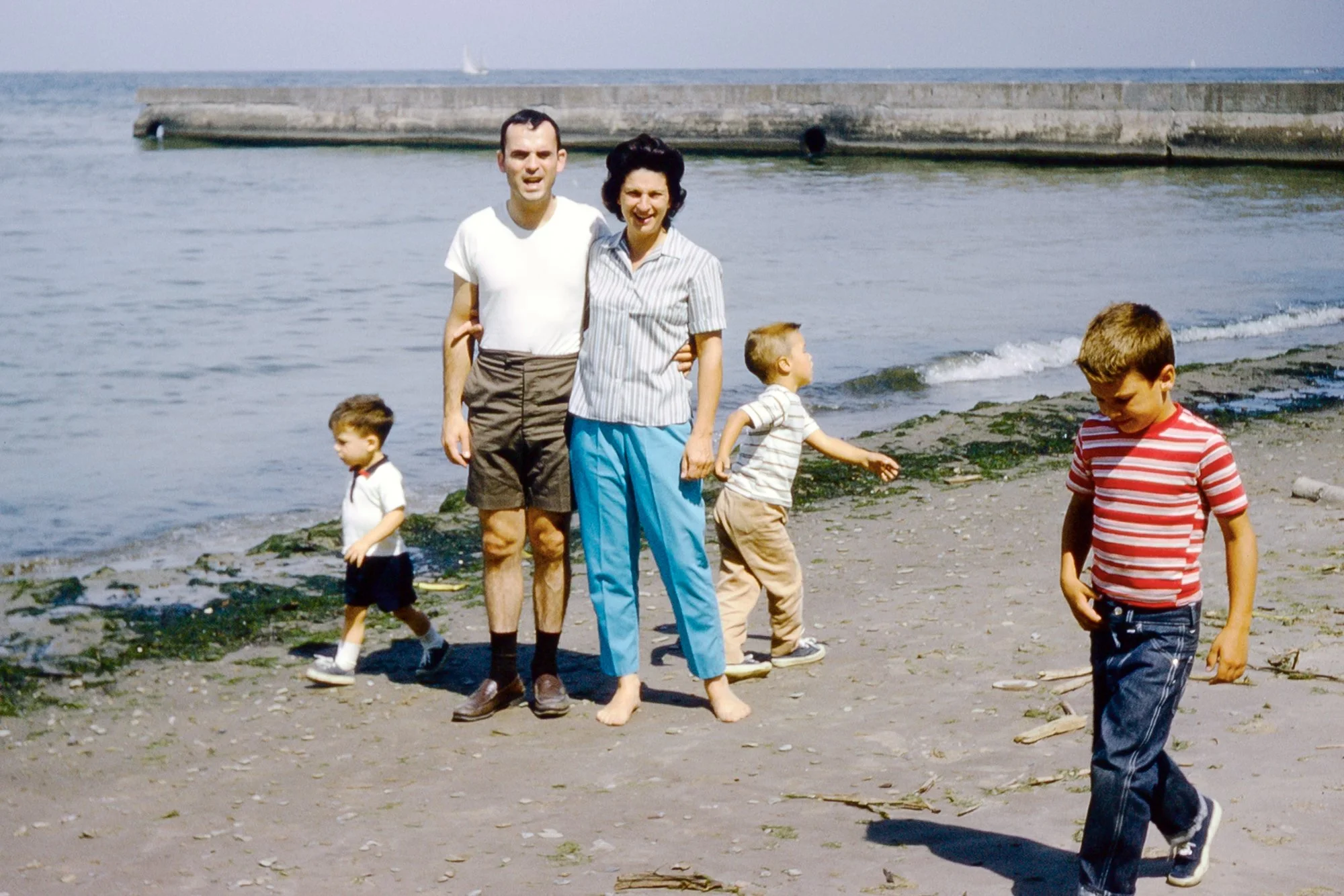 A day spent on the shores of Lake Erie near Cleveland, Ohio—though swimming was off-limits due to unsafe water conditions. In the photo with Bill and Sue are Gregor Rittinger, along with Bill and Rob Travis.