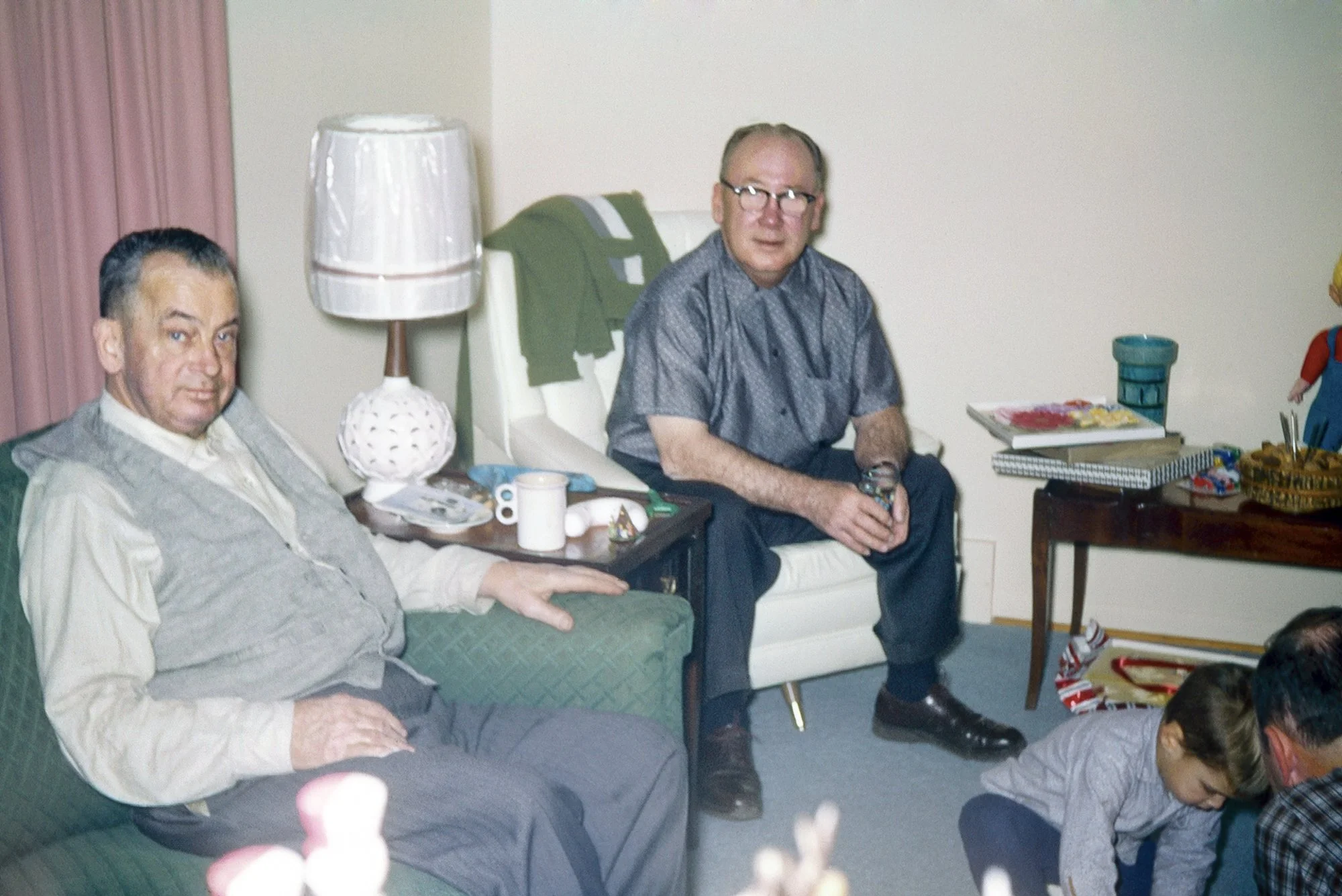 Christmas at Bob and Sues house on Alvin St. (Ed Rittinger, Mr. Cook (neighbor), Rob and Fred Cook on the floor).