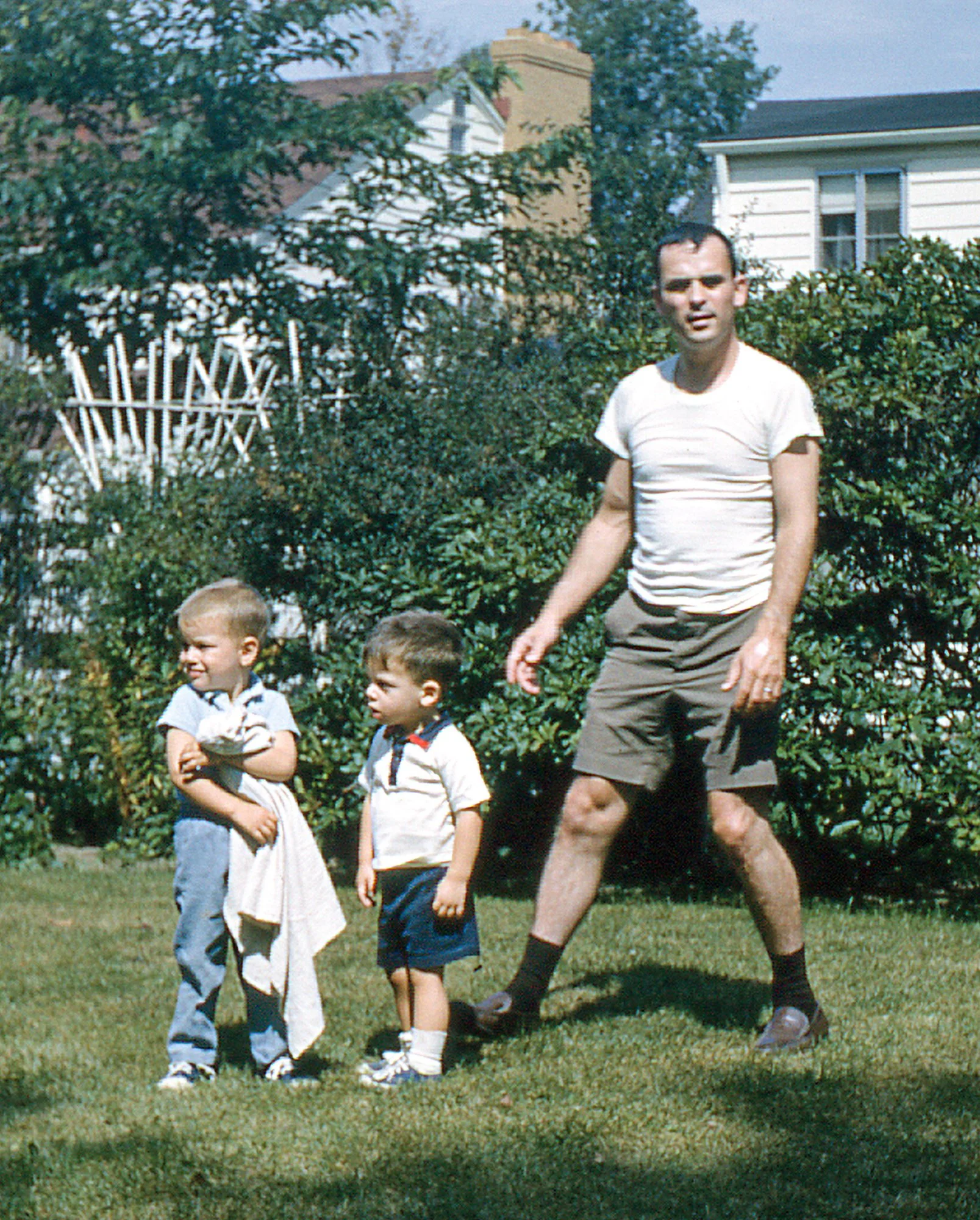 Rich Travis, his trusty Dooie (blanket), and Gregor with his dad, Bill.