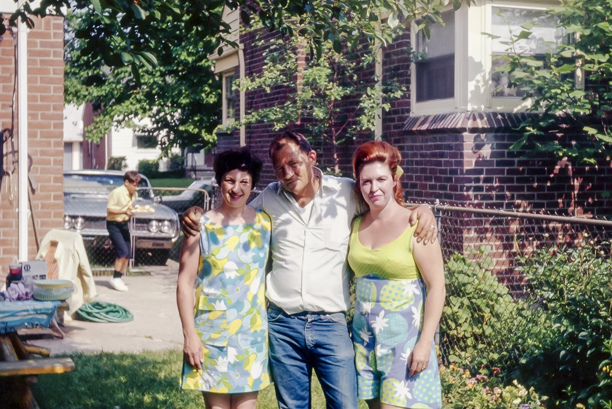 A party at Grandpa’s Kentfield house in Detroit, with Rob in the background, Sue, stepbrother Merle, and stepsister Betty.