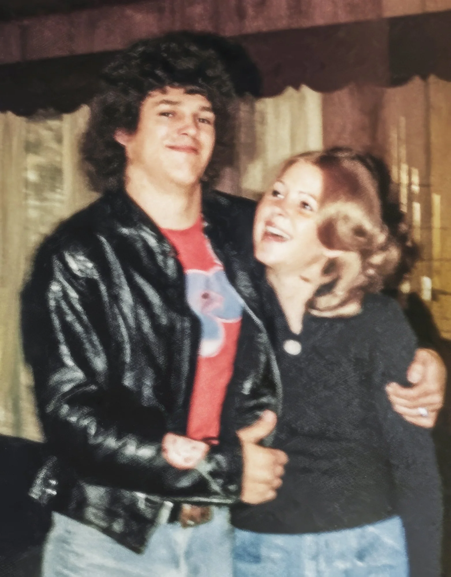 Rob and Roni while dating. The painted rose on a black leather jacket - what was he thinking?