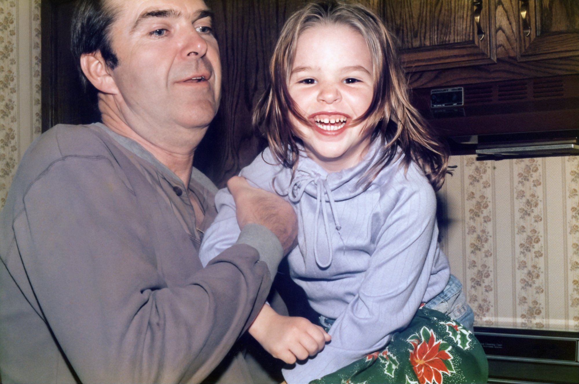 Papa and Kelly horsing around.