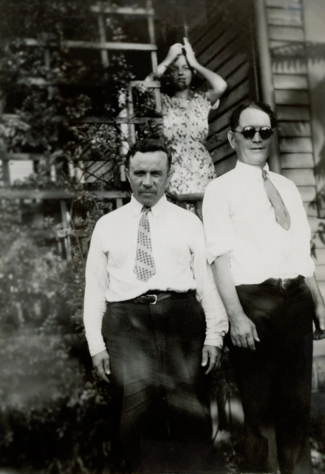 Jacob Jachwak, wearing dark glasses, is on the right. The other two individuals are unidentified friends.