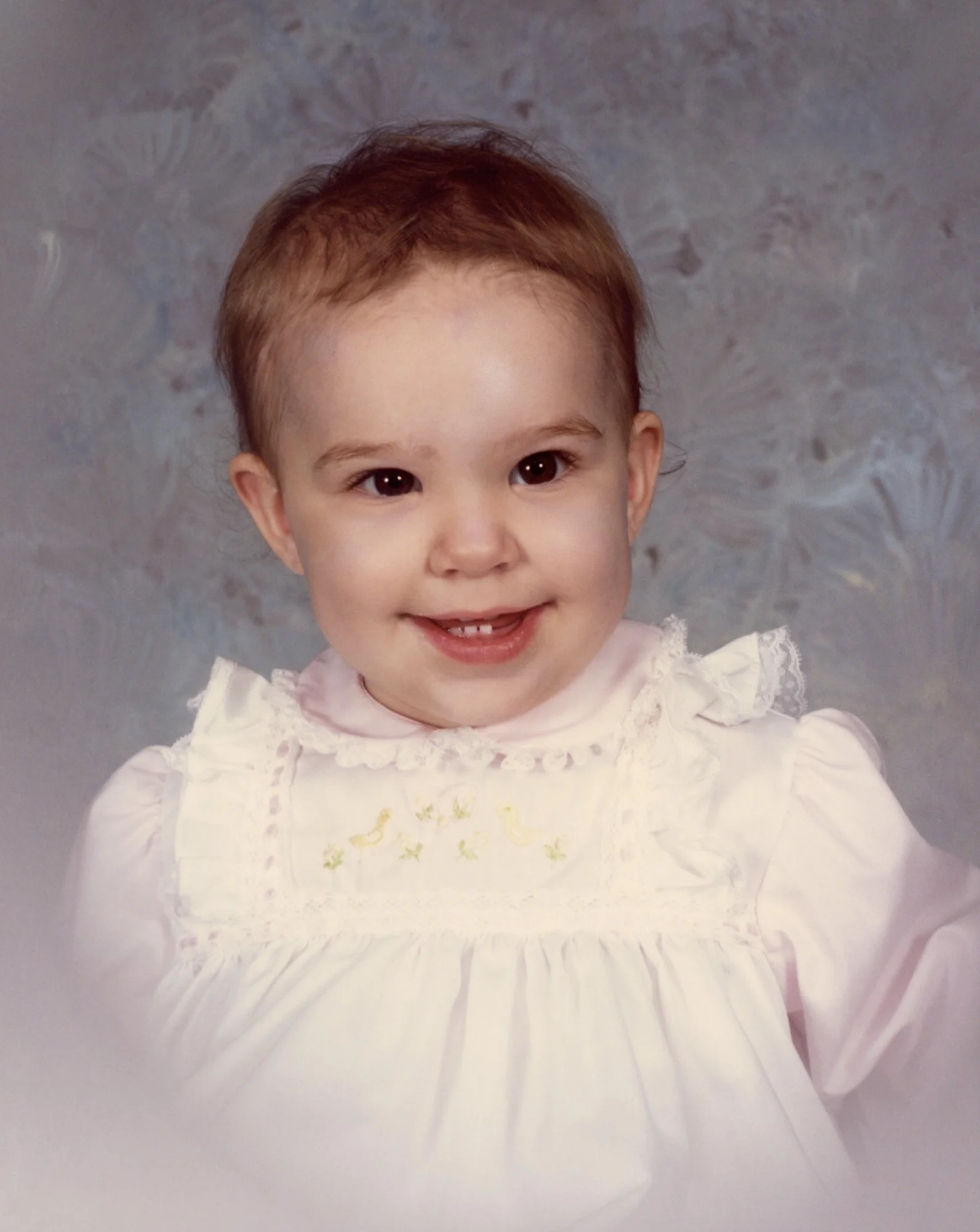 Studio photo of Kelly at about a year old.