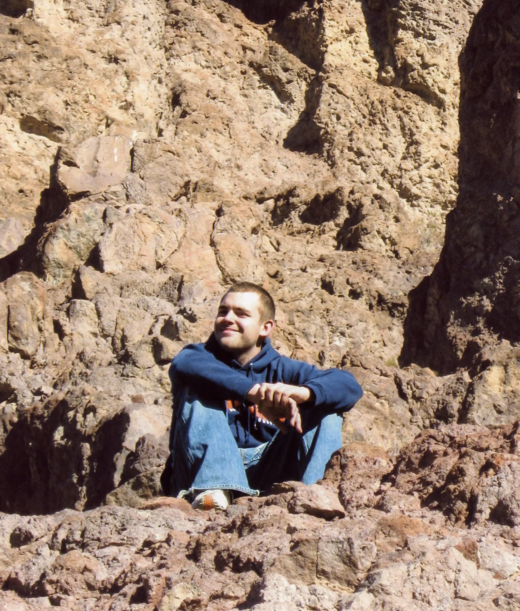 Erik is taking a break from hiking down to the Colorado River, near the Hover Dam. 