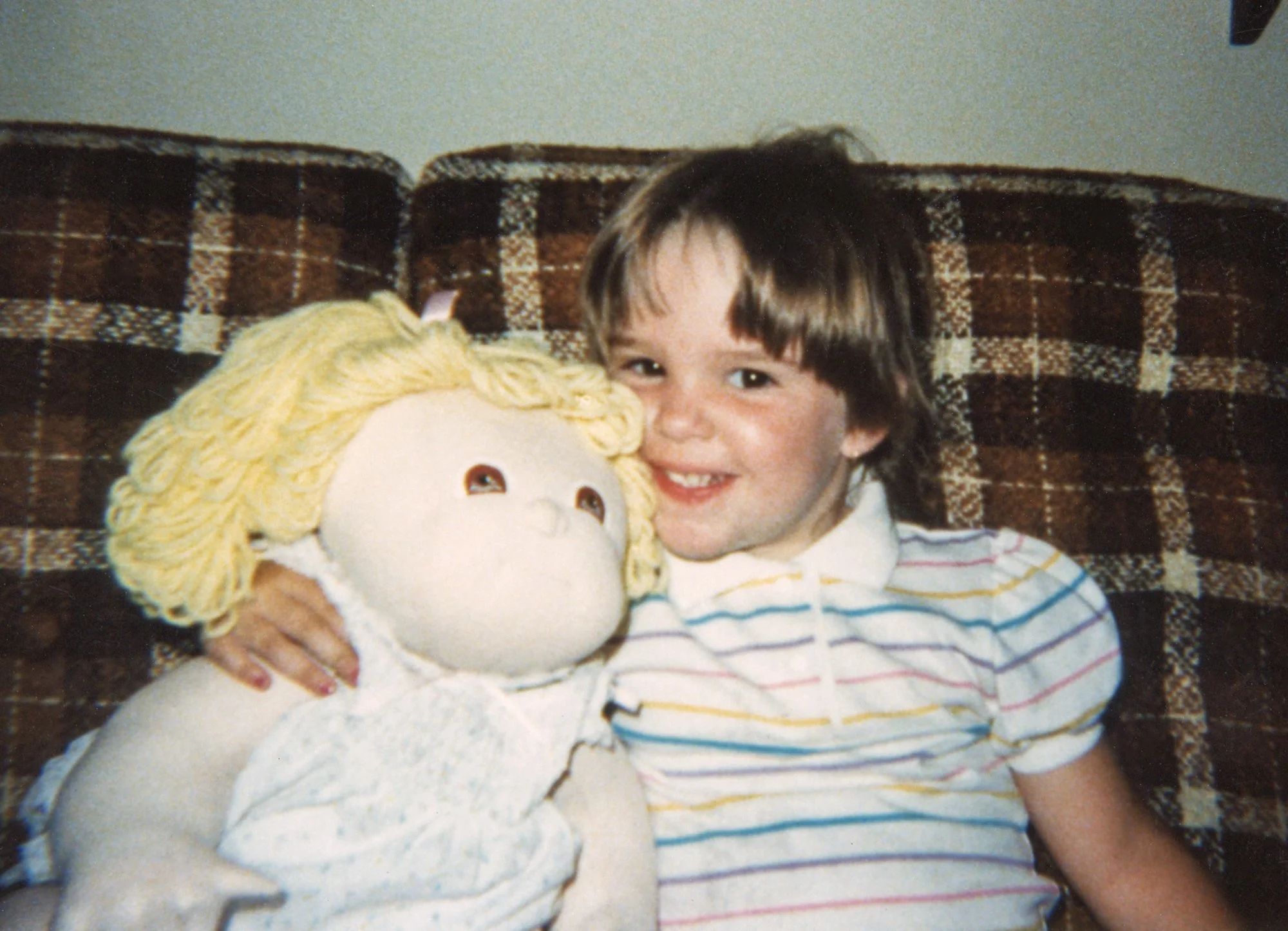 Kelly and her one of her dolls.