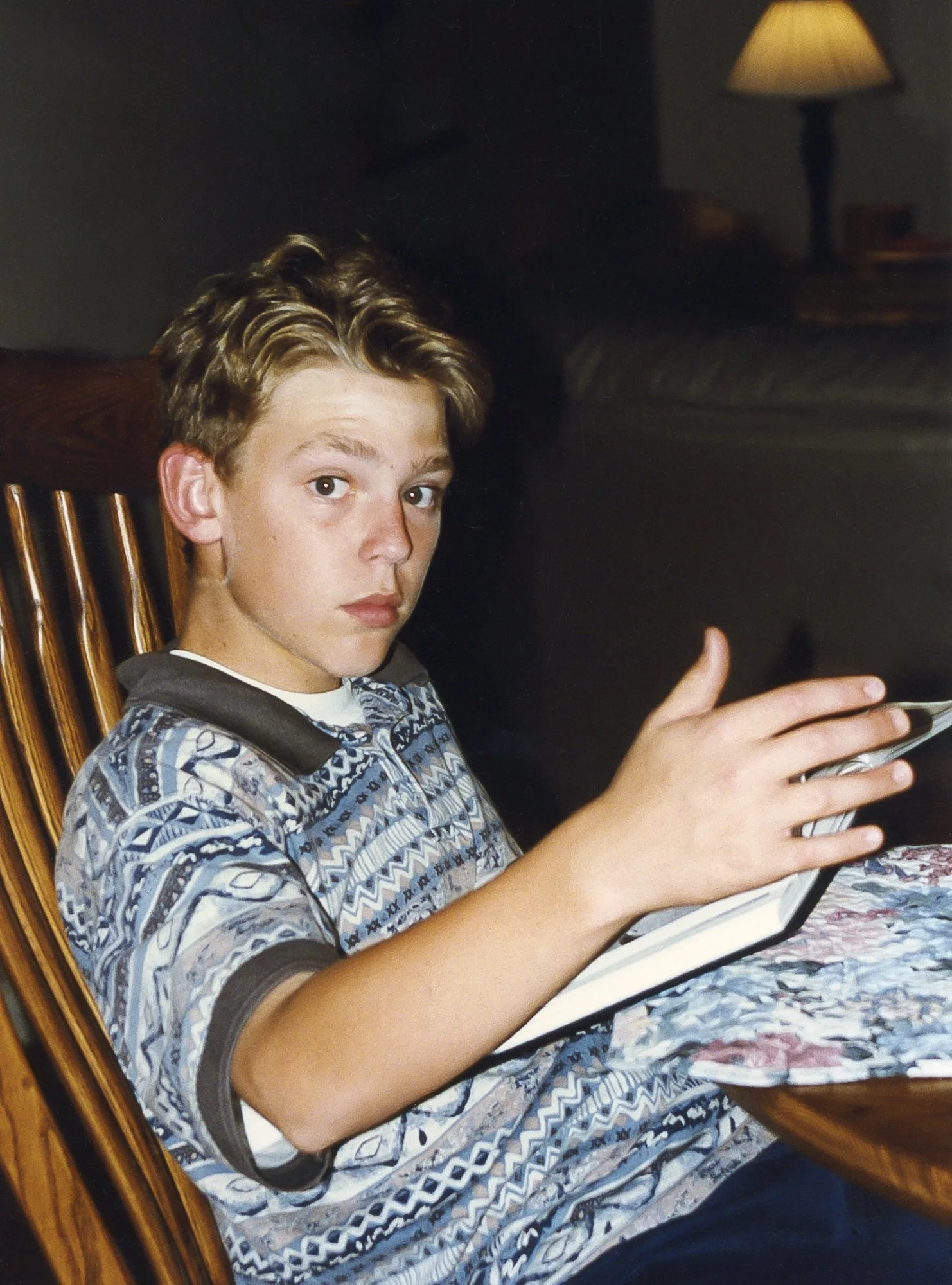 Erik studying at the kitchen table.