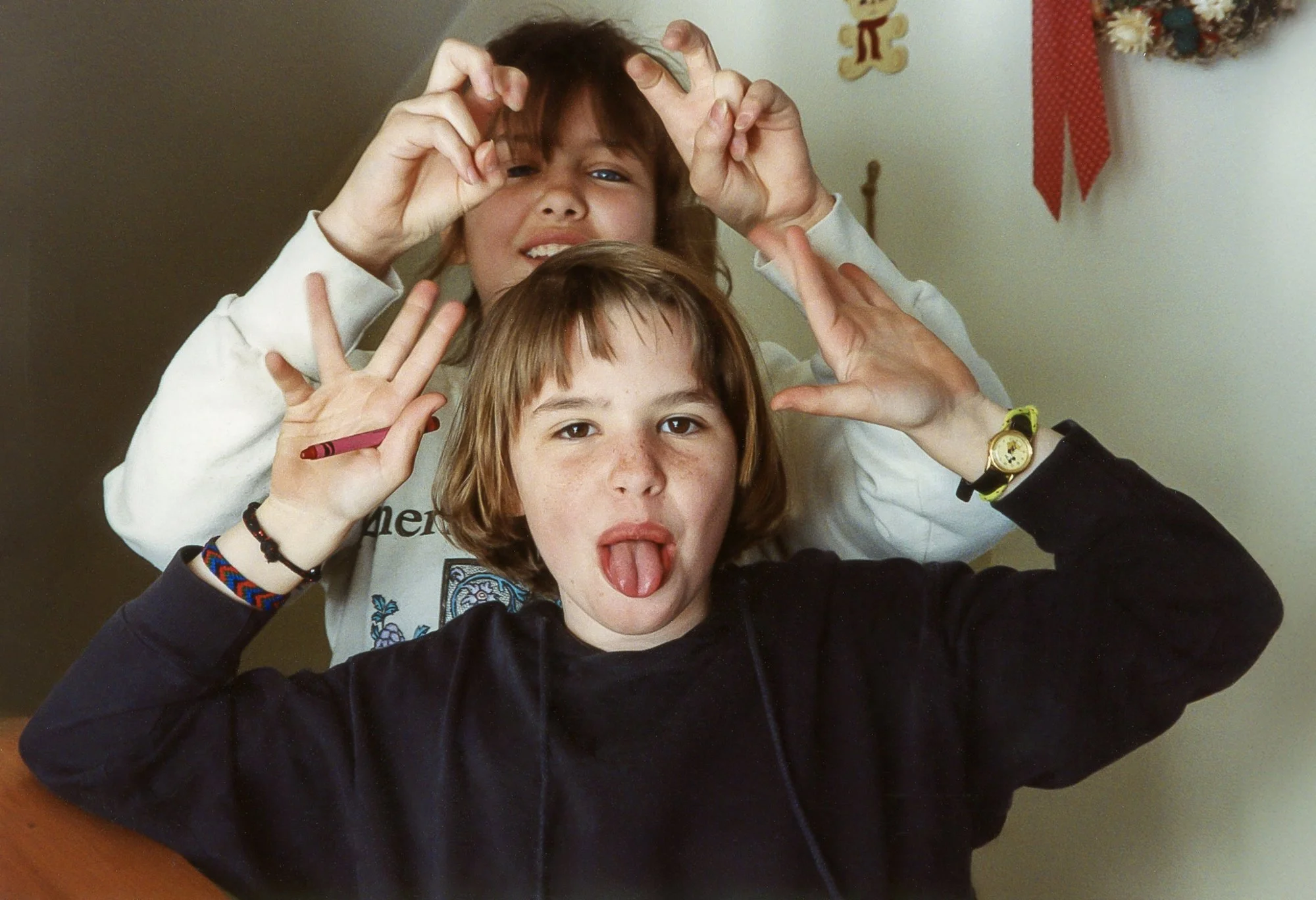 Cousin Heather and Kelly messing around.