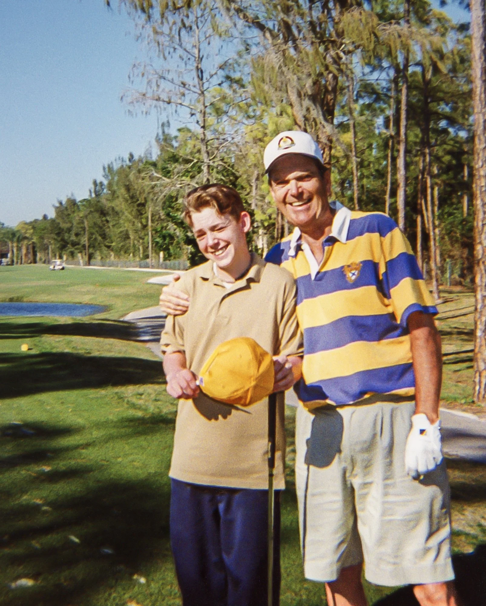 Erik and Papa on the golf course in Florida.