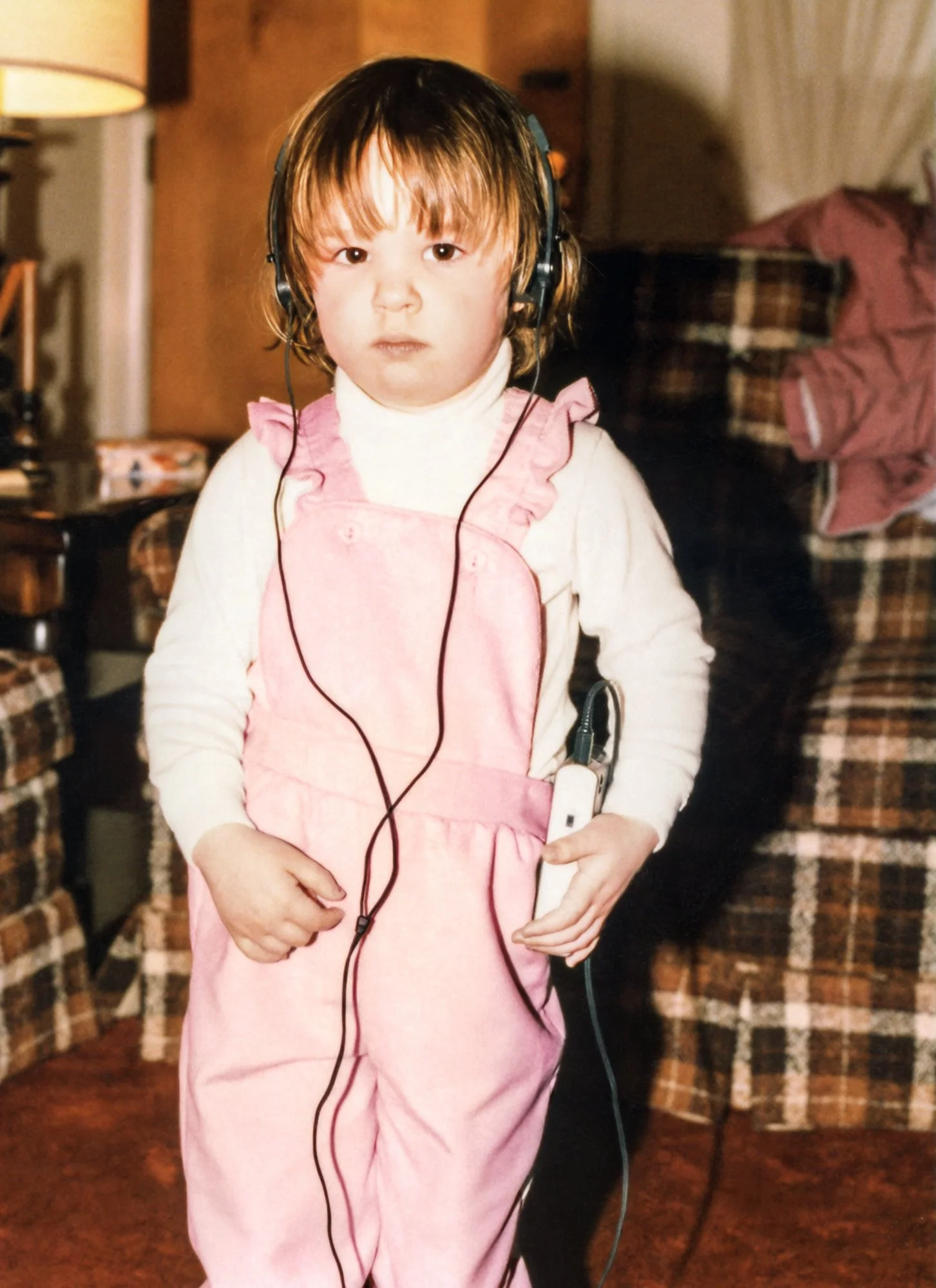 Listening to jams on Dad's Walkman.