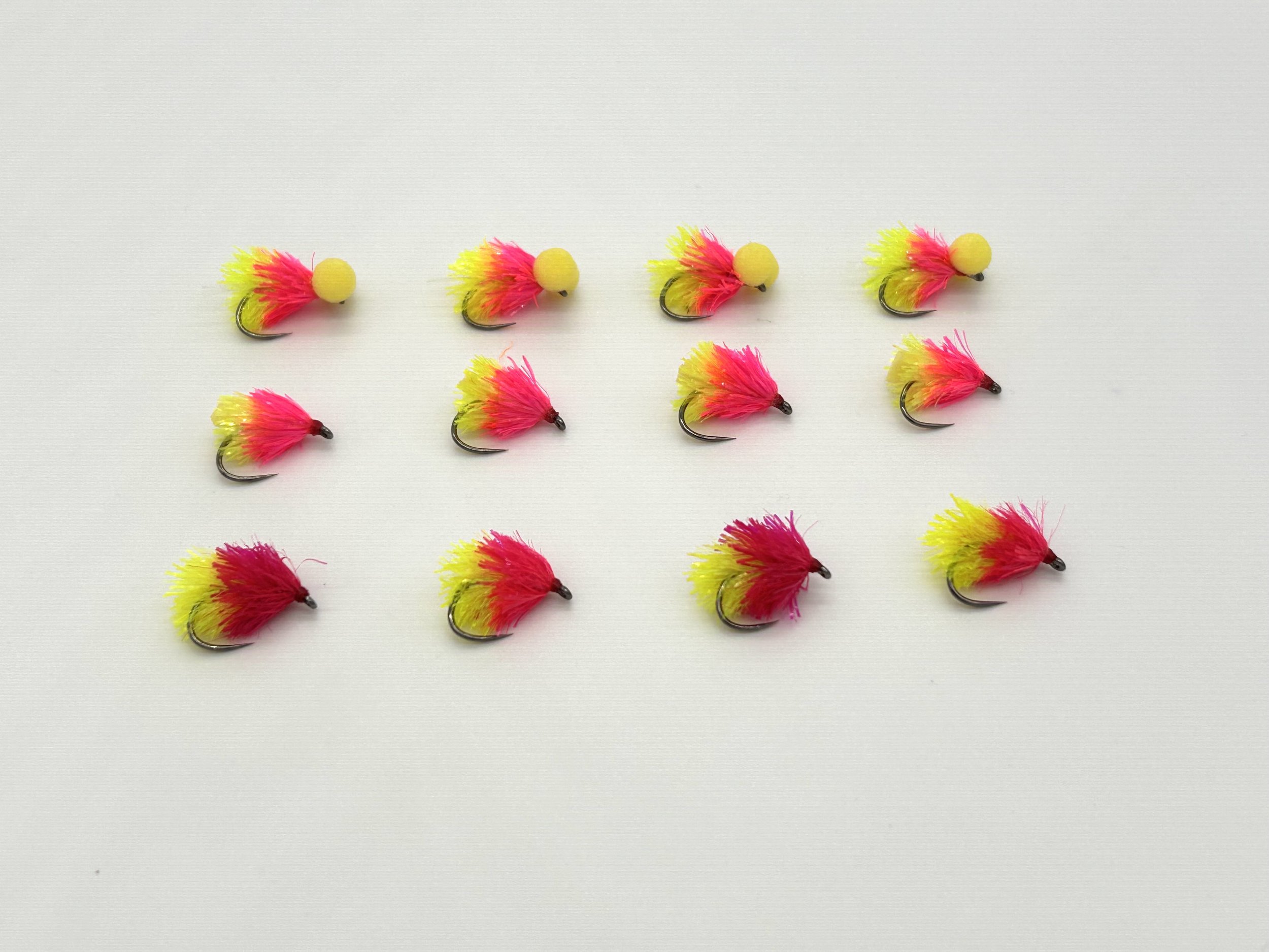 Pack of 12 Pink and Yellow Blobs, Boobies and Foam Arsed Blobs (FABs) flies for fly fishing.