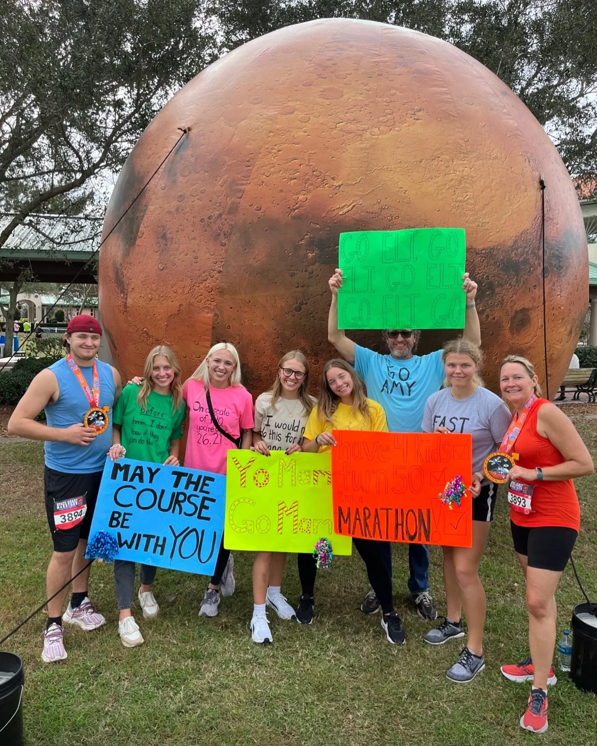 Last Thanksgiving, our brother, Eli and mom, Amy ran a marathon together! The night before we made posters and DIYed some shirts. The day of we got up super early and sent them off. Throughout the race we traveled to 10 different spots. We spent the 