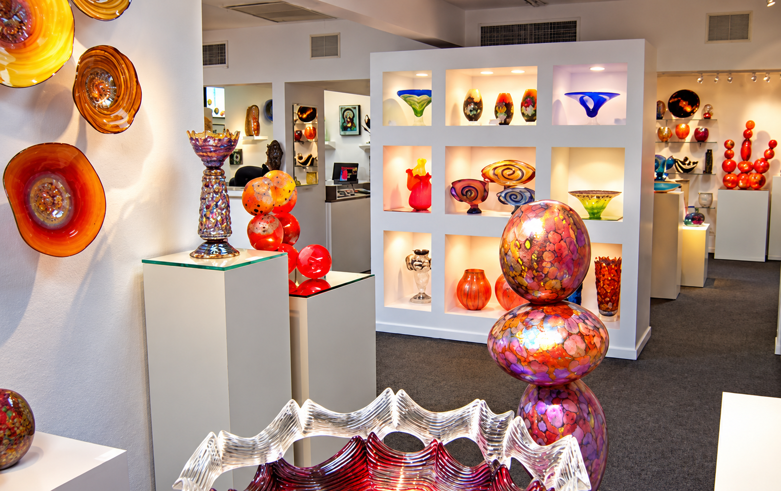 Handblown glass art sculptures vases and decorative artwork at Philabaum Glass Gallery in Marana Oro Valley Tucson Arizona