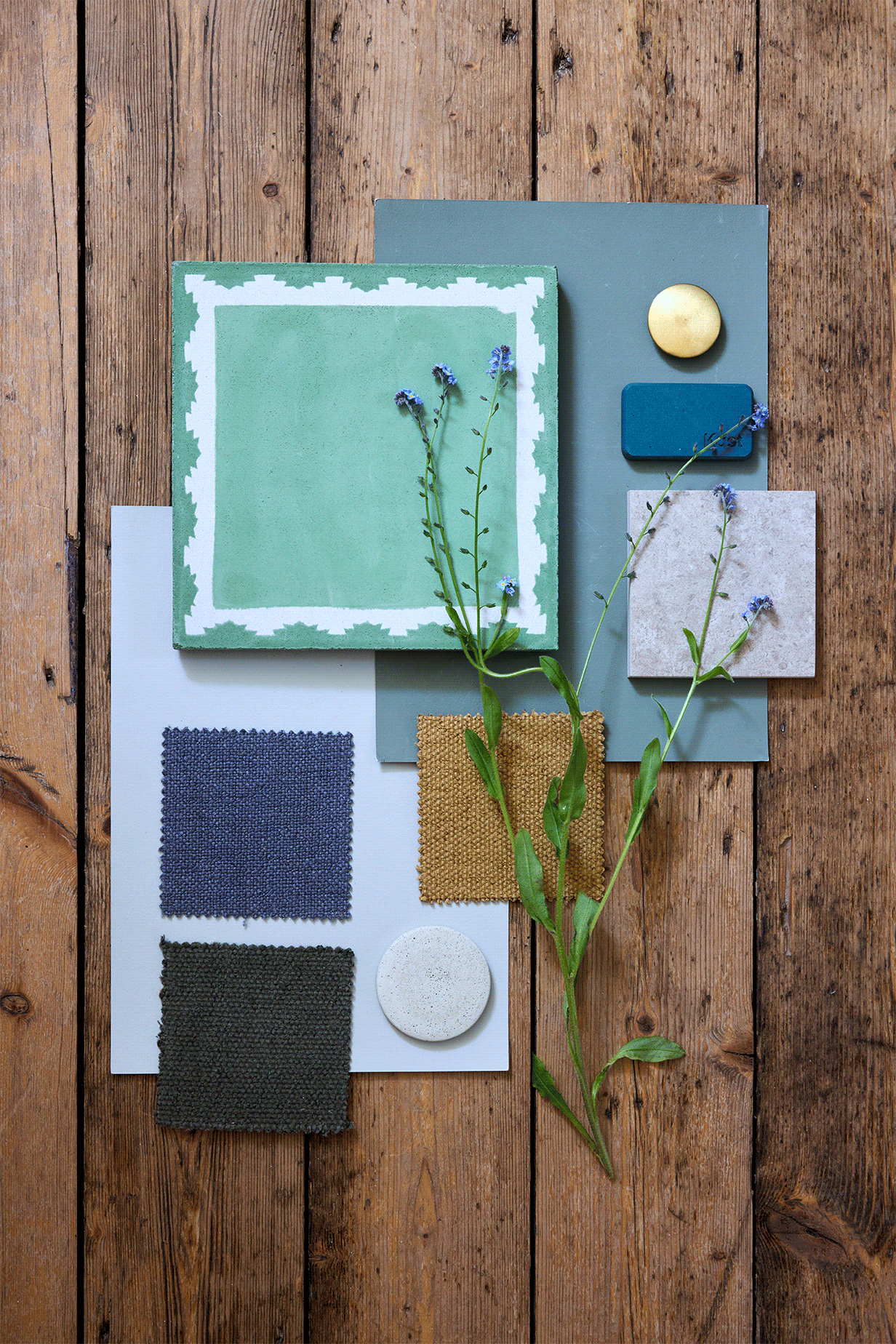 Interior textile mood board with earthy tones, natural fabrics, and material samples.
