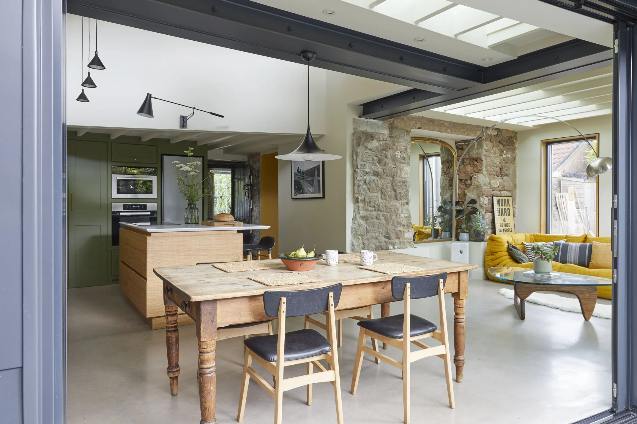 Kitchen and dining space connecting to the private courtyard terrace